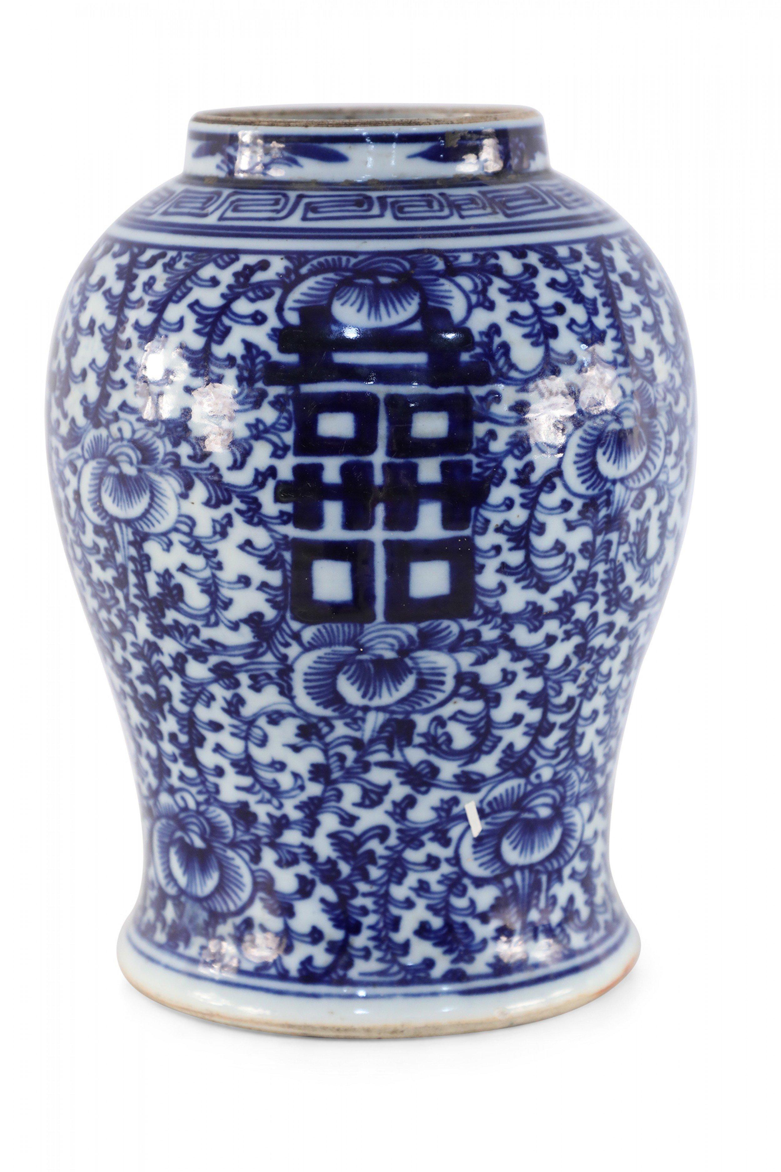 Chinese Export Chinese Off-White and Navy Vine Motif Porcelain Urn Vase For Sale