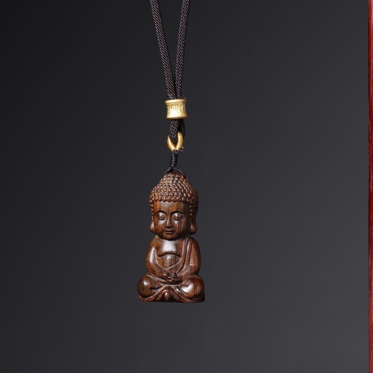 20th Century Old Chinese Agarwood Carving Sitting Baby Buddha Pendent For Sale