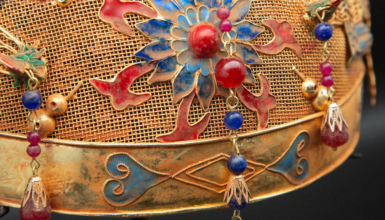 Chinese opera theatre headdress, dragons. Chinese opera theatre headdress in turquoise enamel birds with red colored ornamentation, and dragons. Mid-20th century, mounted on a custom black painted metal base. 12