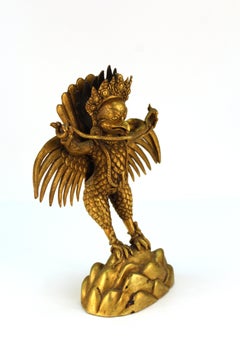 Chinese or Tibetan Gilt Bronze Garuda with Naga Sculpture