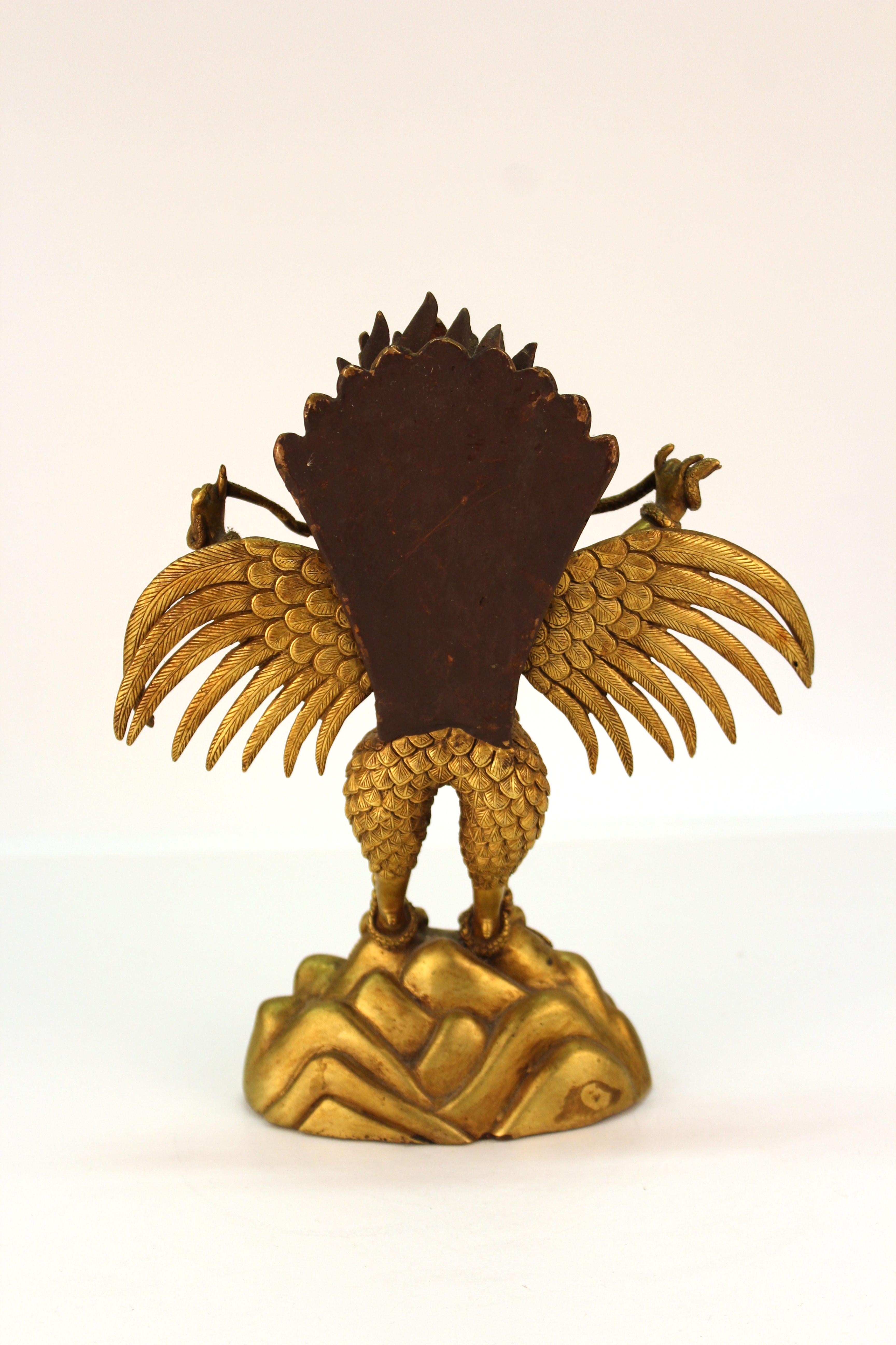 Chinese or Tibetan Gilt Bronze Garuda with Naga Sculpture In Good Condition In New York, NY