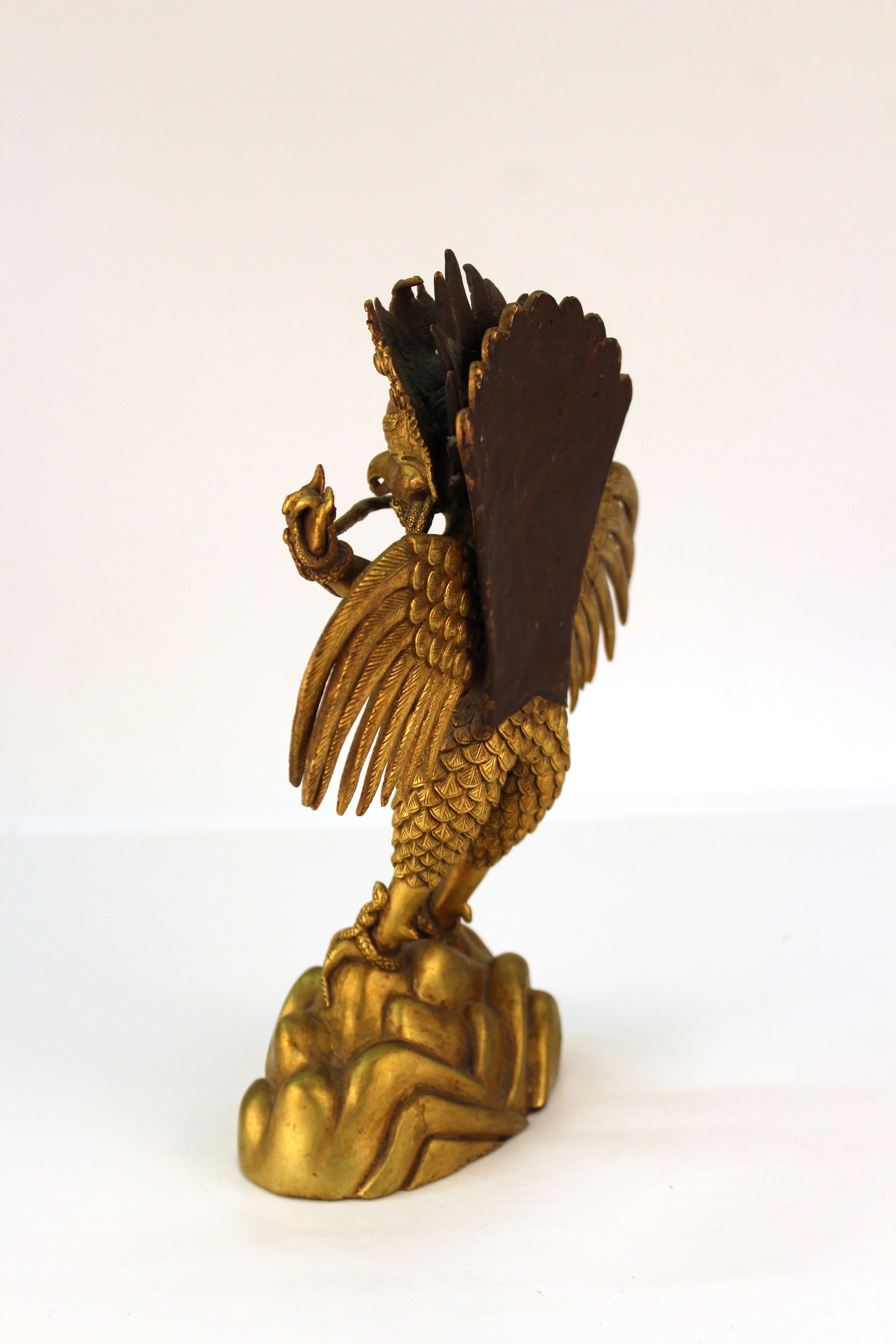 20th Century Chinese or Tibetan Gilt Bronze Garuda with Naga Sculpture