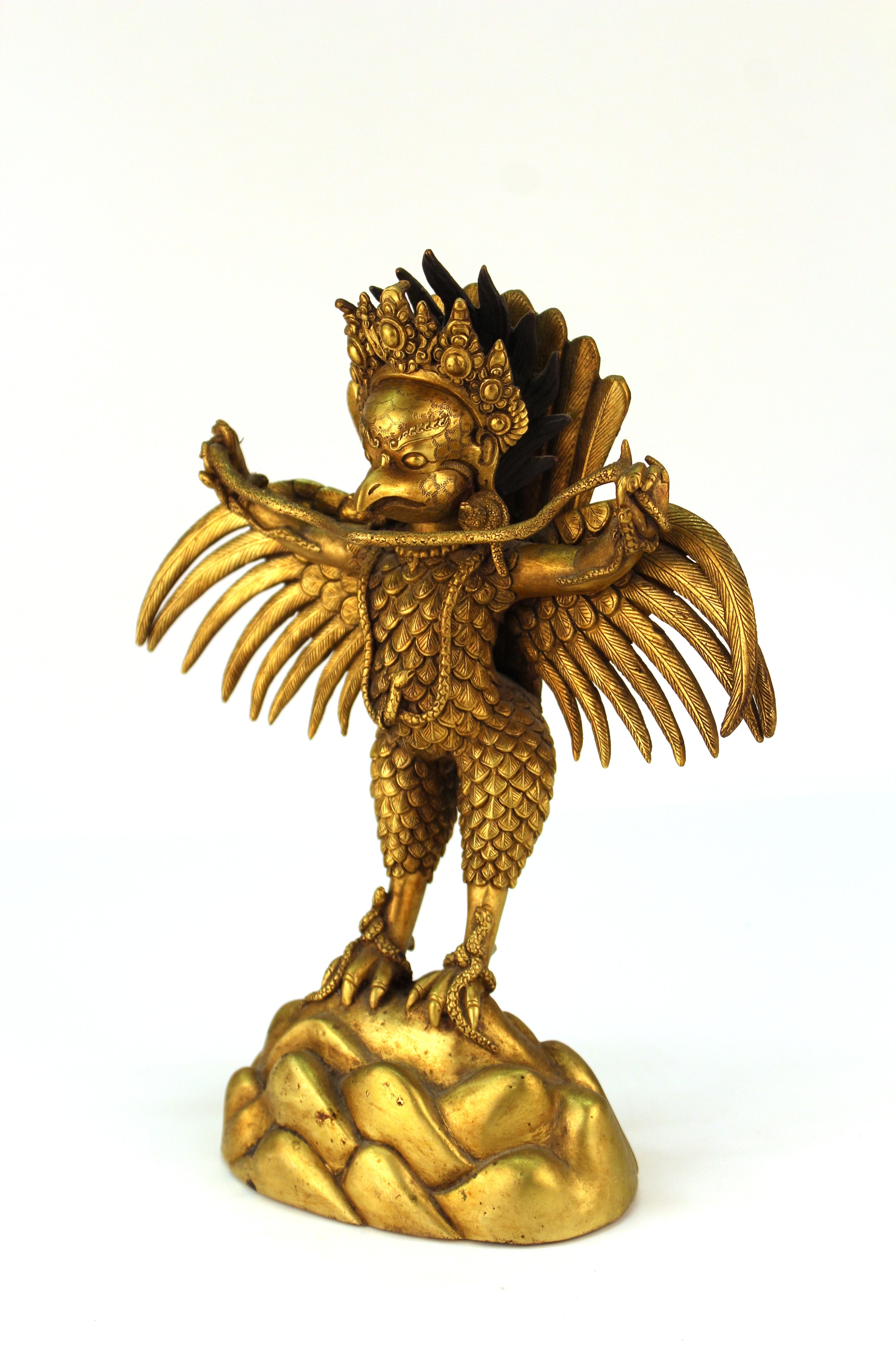 Chinese or Tibetan Gilt Bronze Garuda with Naga Sculpture 1