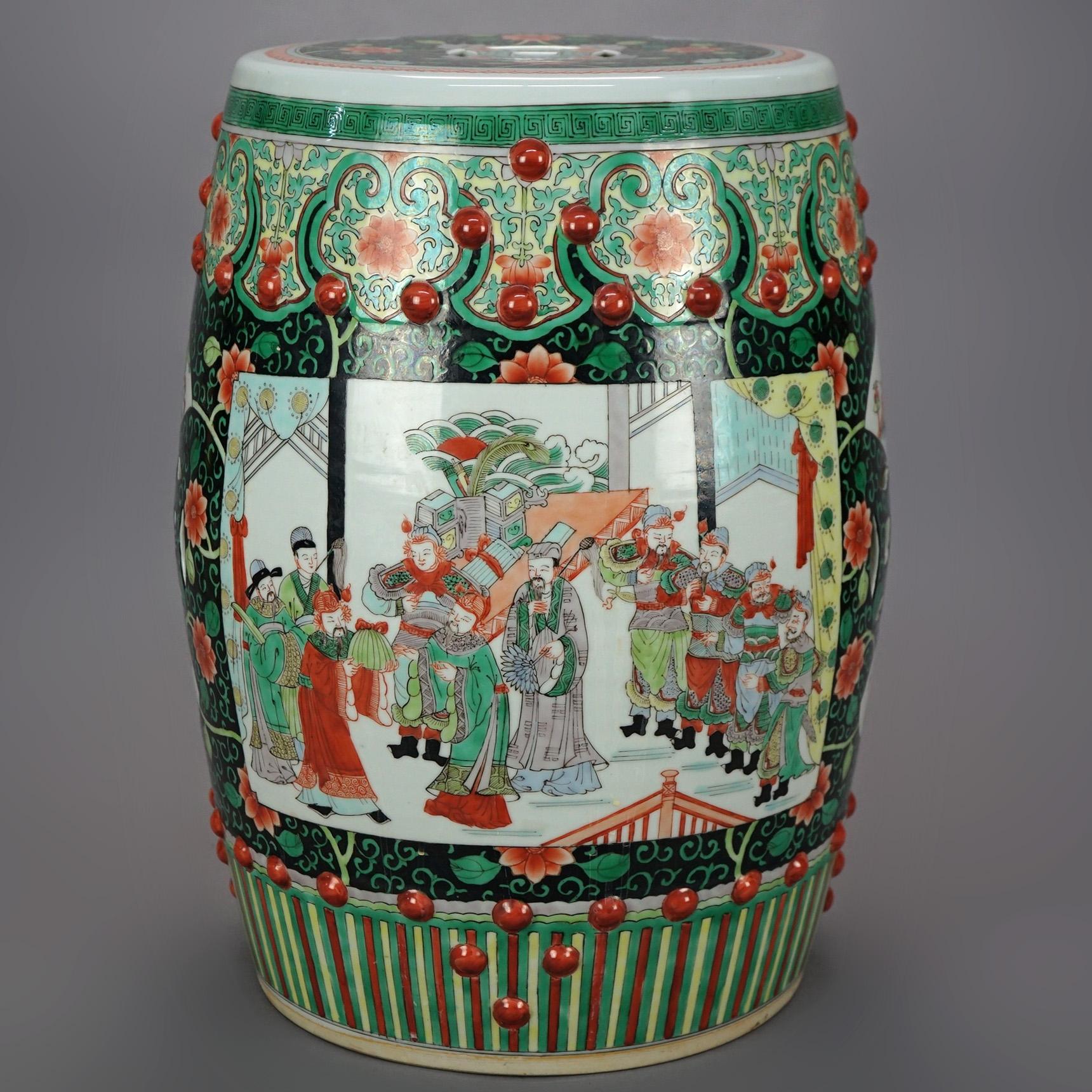 A Chinese porcelain garden seat offers porcelain construction with hand painted garden genre scenes with figures, 20th century

Measures - 19