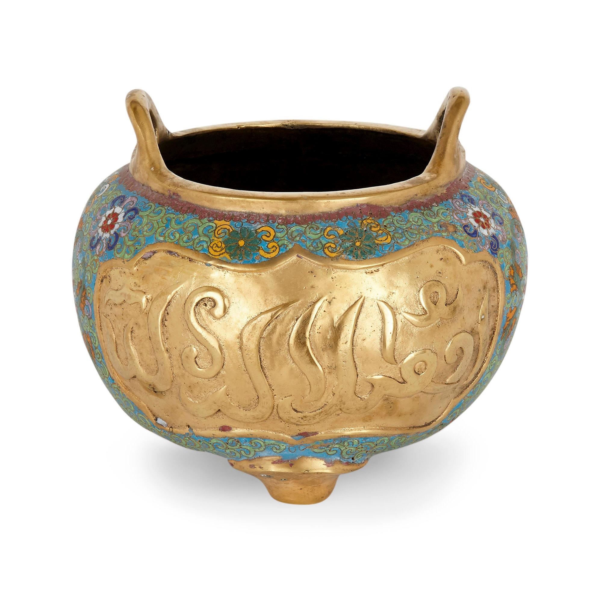 Chinese ormolu and cloisonné enamel vase for the Islamic Market
Chinese, early 20th century
Dimensions: Height 20cm, diameter 23cm

Crafted in China, this fine ormolu and cloisonné enamel bowl was intended for export to Islamic markets. Sitting