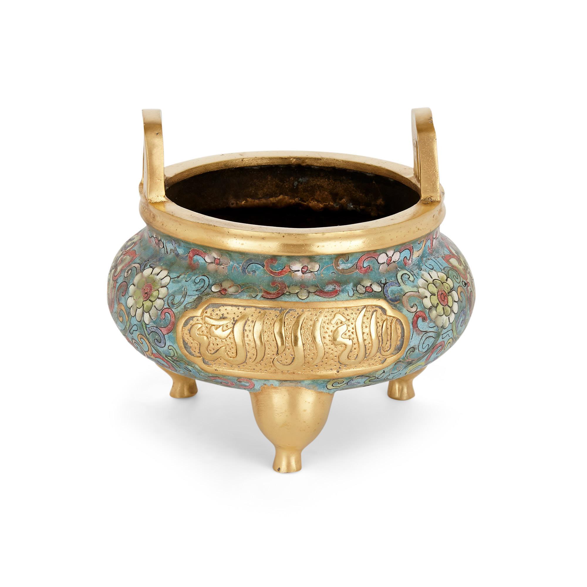 Chinese ormolu and cloisonné enamel vase for the Islamic market
Chinese, early 20th century
Dimensions: Height 14cm, diameter 15cm

Crafted in China, this fine ormolu and cloisonné enamel bowl was intended for export to Islamic markets. Sitting