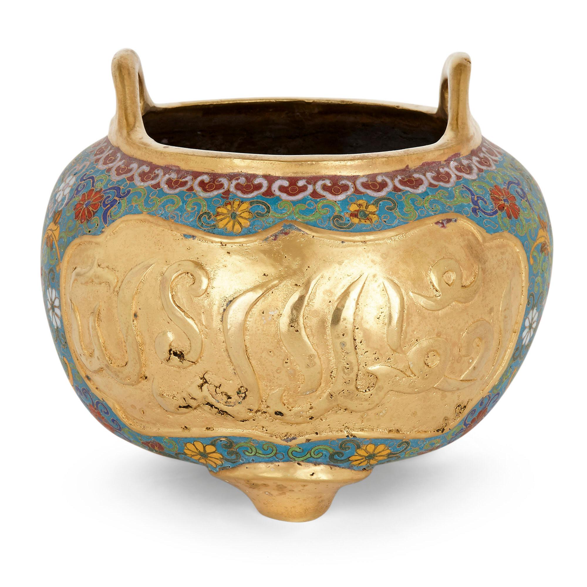 Chinese Ormolu and Cloisonné enamel vase for the Islamic Market
Chinese, early 20th century
Dimensions: Height 19cm, diameter 23cm

Crafted in China, this fine ormolu and cloisonné enamel bowl was intended for export to Islamic markets. Sitting