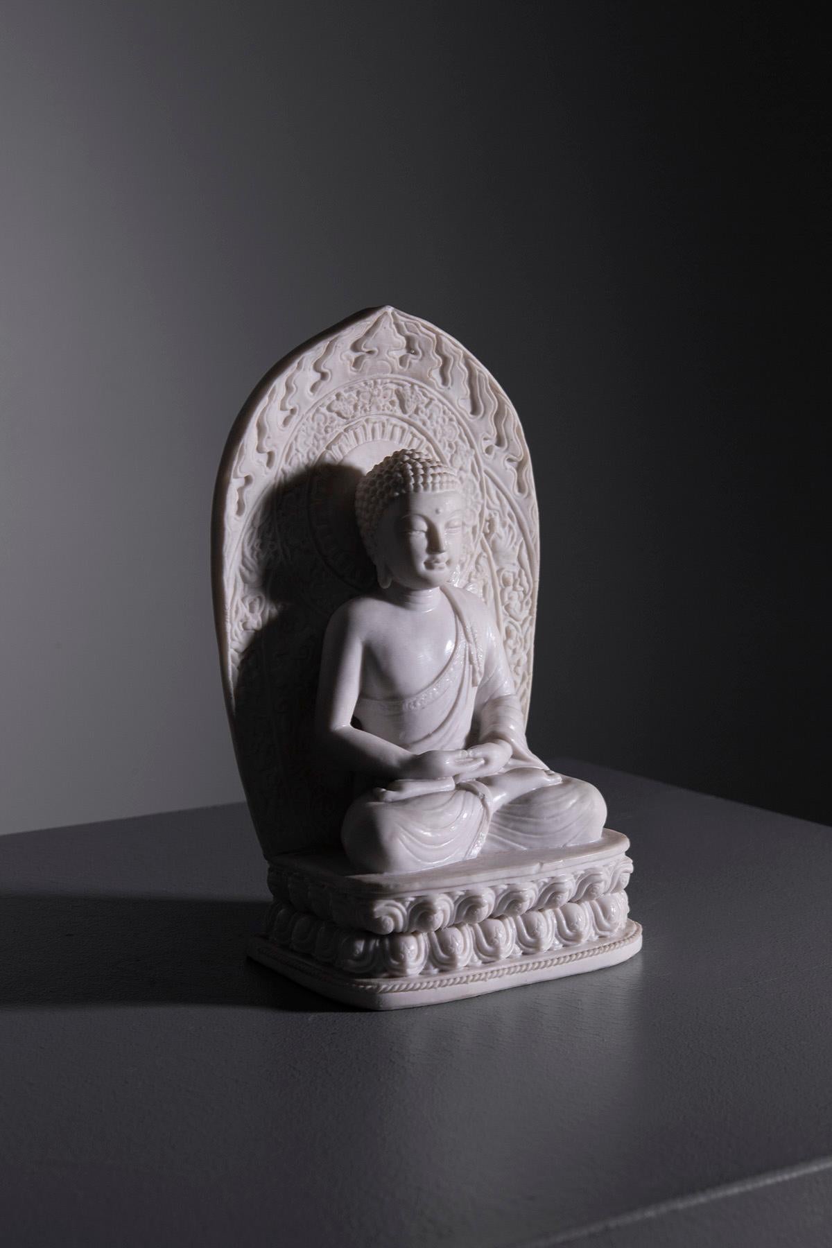Explore the essence of serenity and traditional craftsmanship with this exquisite Chinese Buddha statuette. Perfectly capturing the spirit of Buddhist art, this piece features a serene Buddha in a meditative pose, intricately carved to showcase the