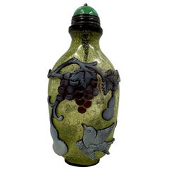 Chinese Overlaid Peking Glass Snuff Bottle with Scoop
