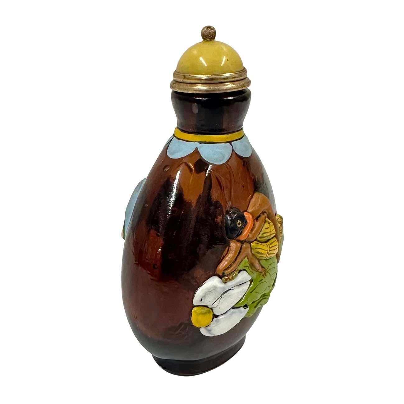 This Chinese Overlaid Peking Glass Master Snuff Bottle was hand made with beautiful carved bird and dragon fly on each sides. The shaped spherical pale body overlaid and cut on each side with an multi colored chimera, on a raised foot, jade cap with