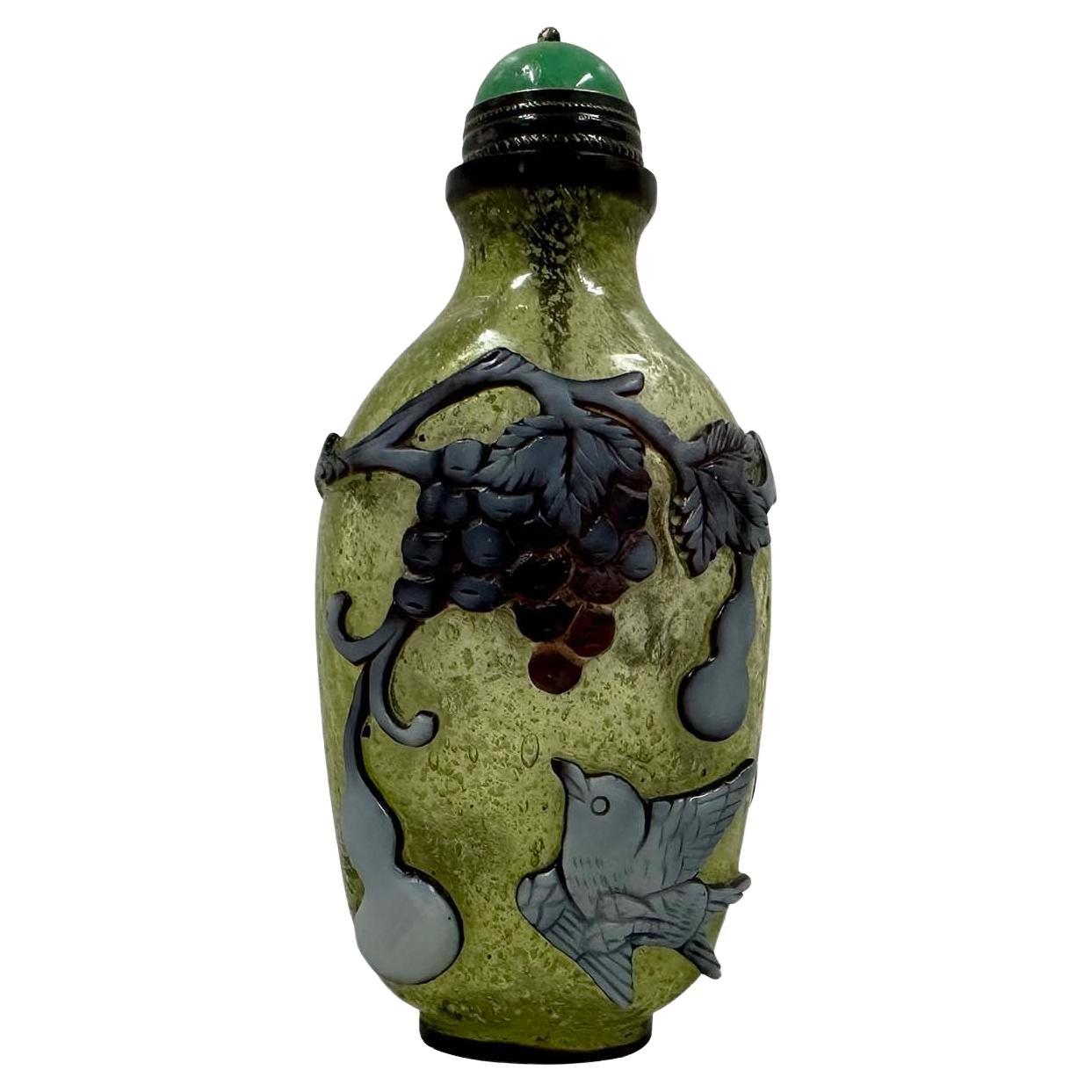 Chinese Overlaid Peking Glass Snuff Bottle with Scoop
