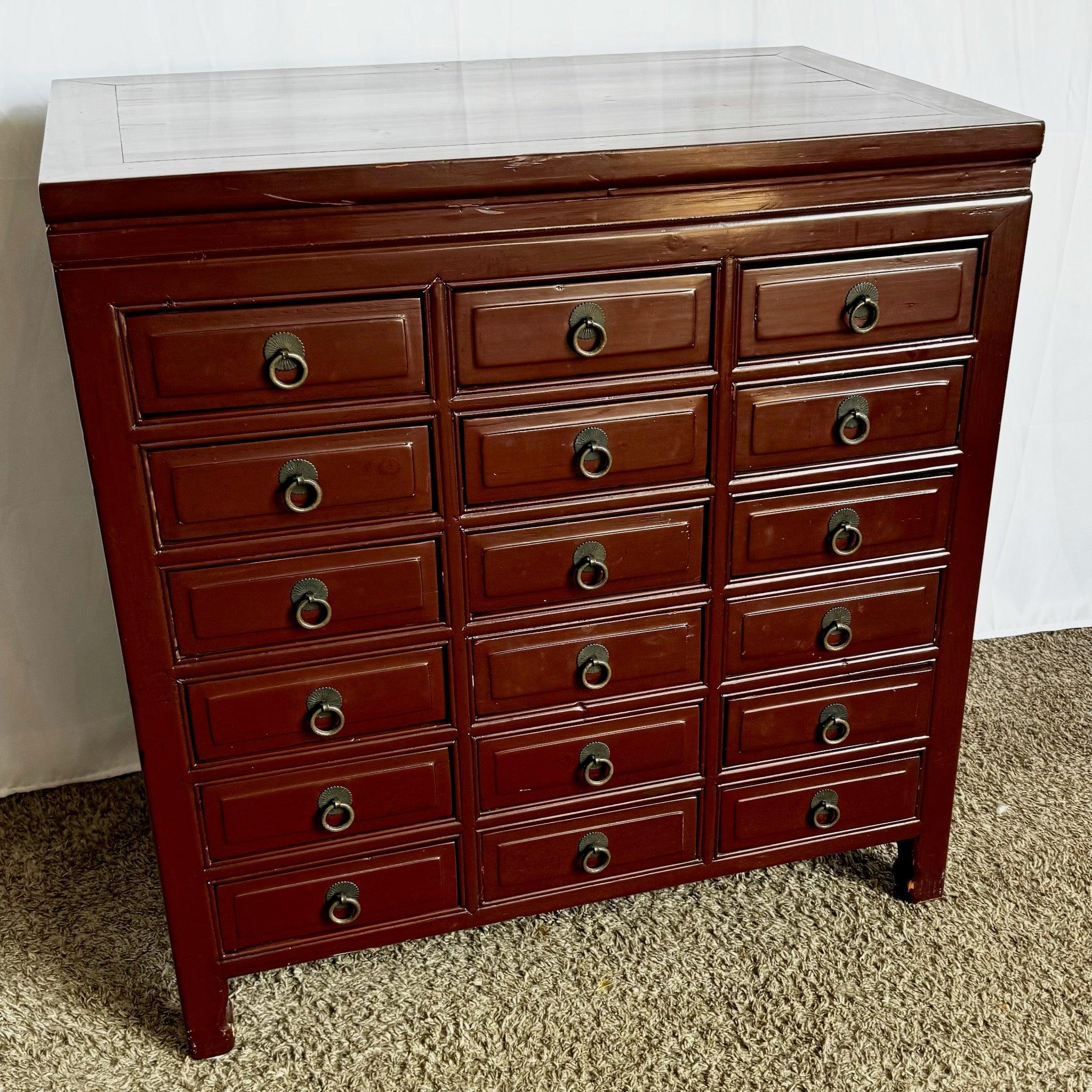 Vintage Chinese Oxblood Red Chest of Drawers with rich lacquer finish and brass ring pulls, blending traditional craftsmanship with functional storage.
 
 Some wear around the edges as shown in the photos.