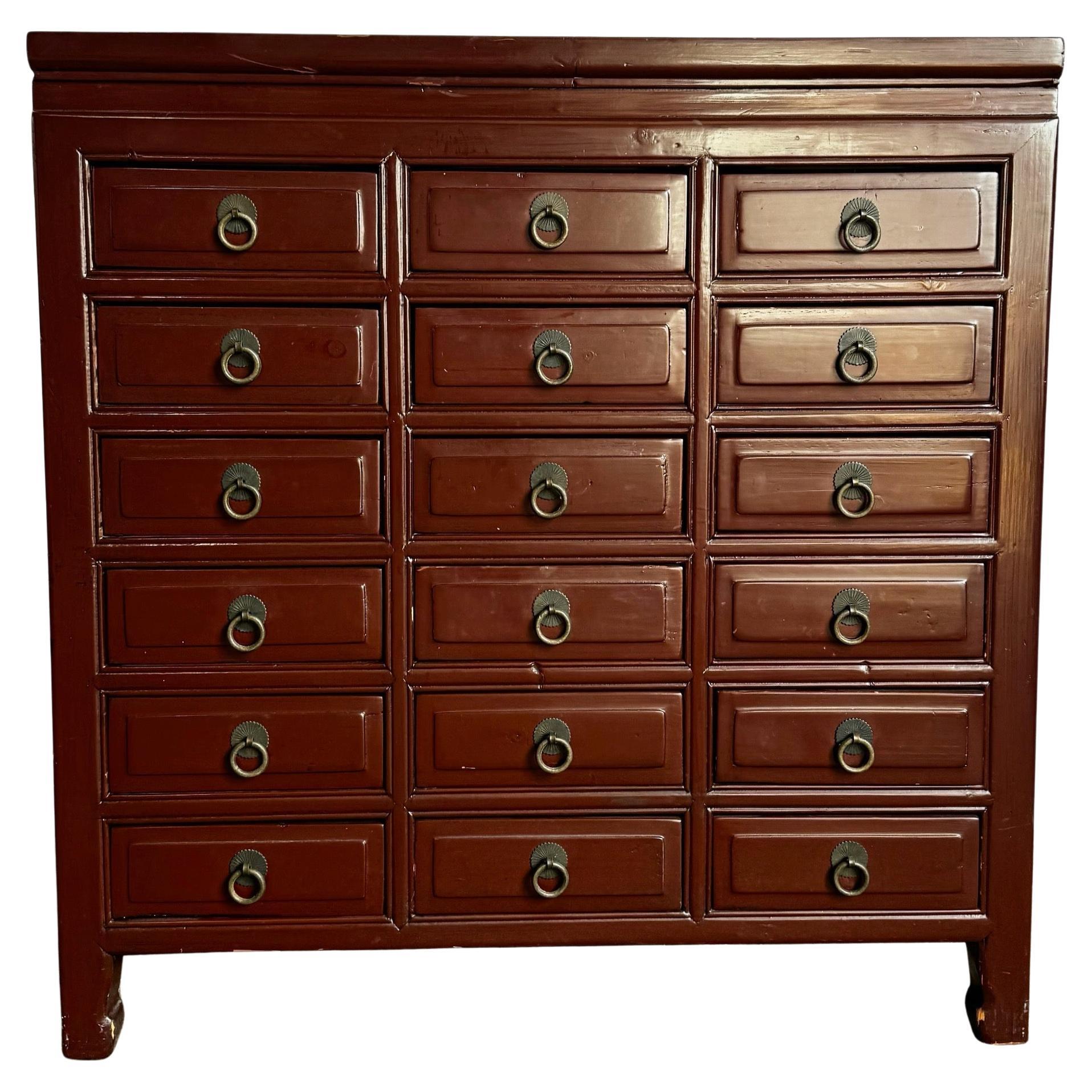 Chinese Ox Blood Red Apothecary Chest of Drawers For Sale