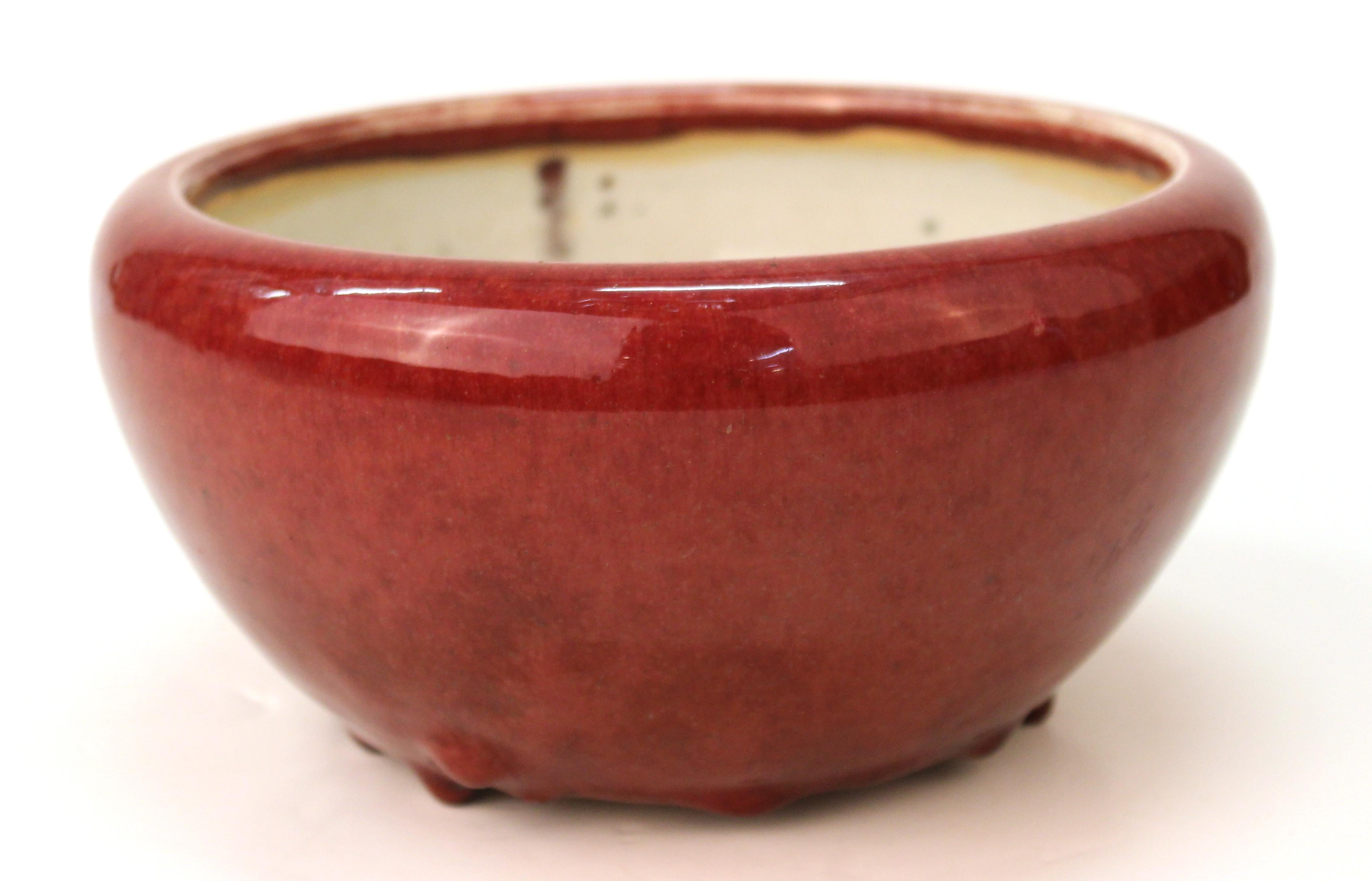 Chinese oxblood enamel-glazed incense burner bowl, the foot with controlled heavy glaze drips. The piece was made in China, possibly during the early 20th century and is in good vintage condition.