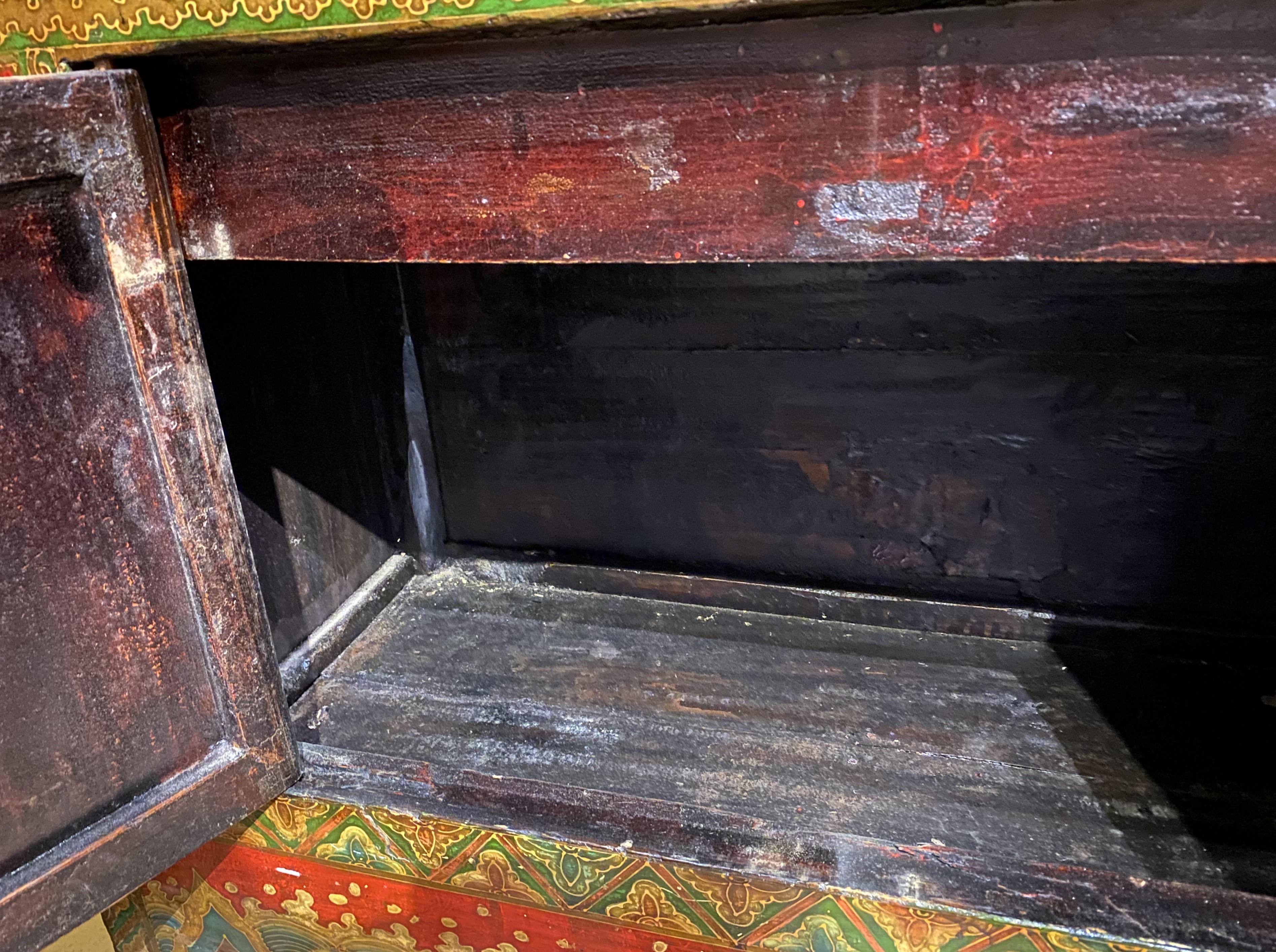 Chinese Paint Decorated Two Door Cabinet with Carved Gallery and Top Lid For Sale 2
