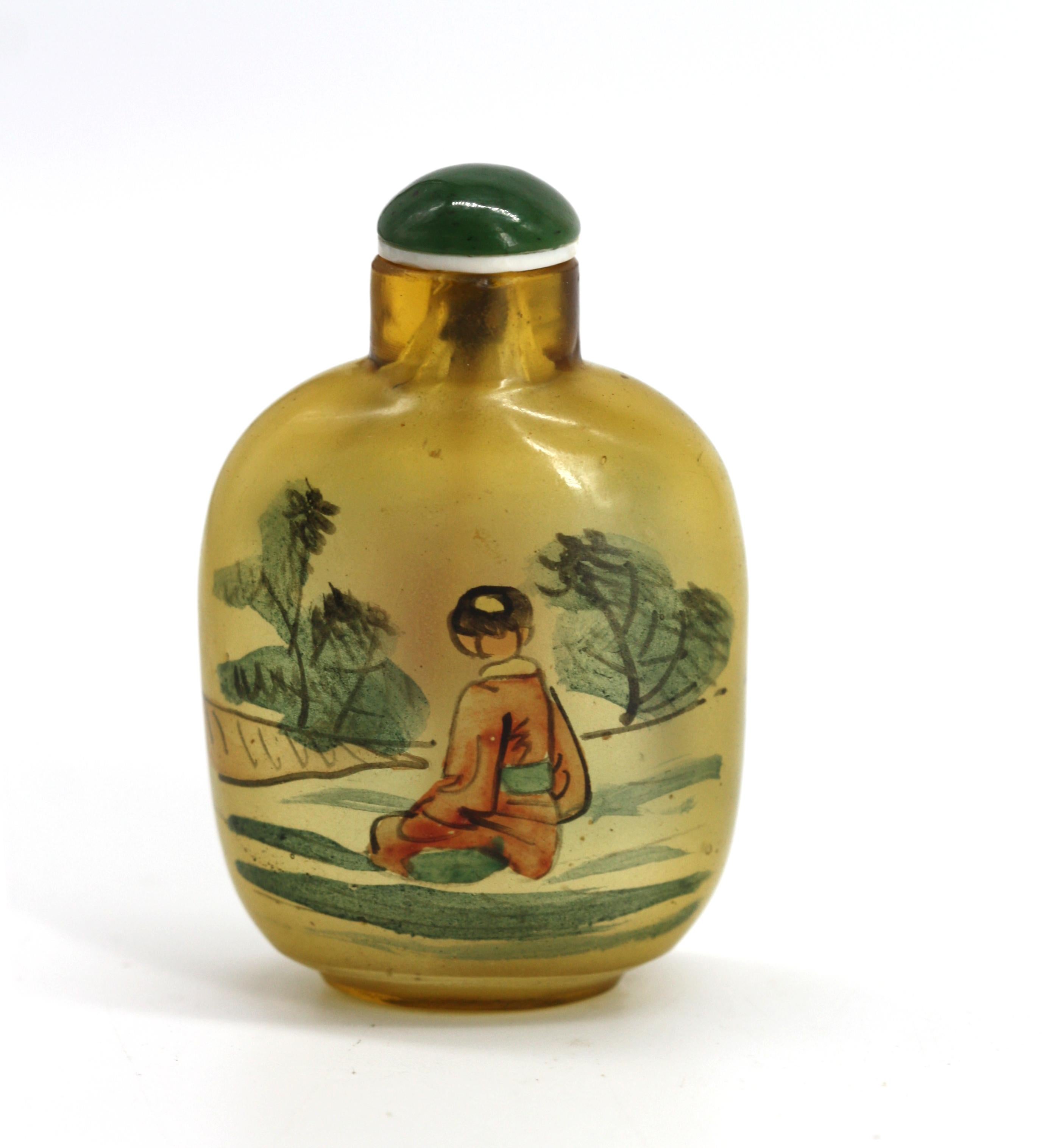 
Chinese Painted Glass Snuff Bottle
The flattened oval bottle decorated on each side with a young boy in a landscape, jade cap with spoon.
Height 2.5 in.
Condition Report
Good condition.