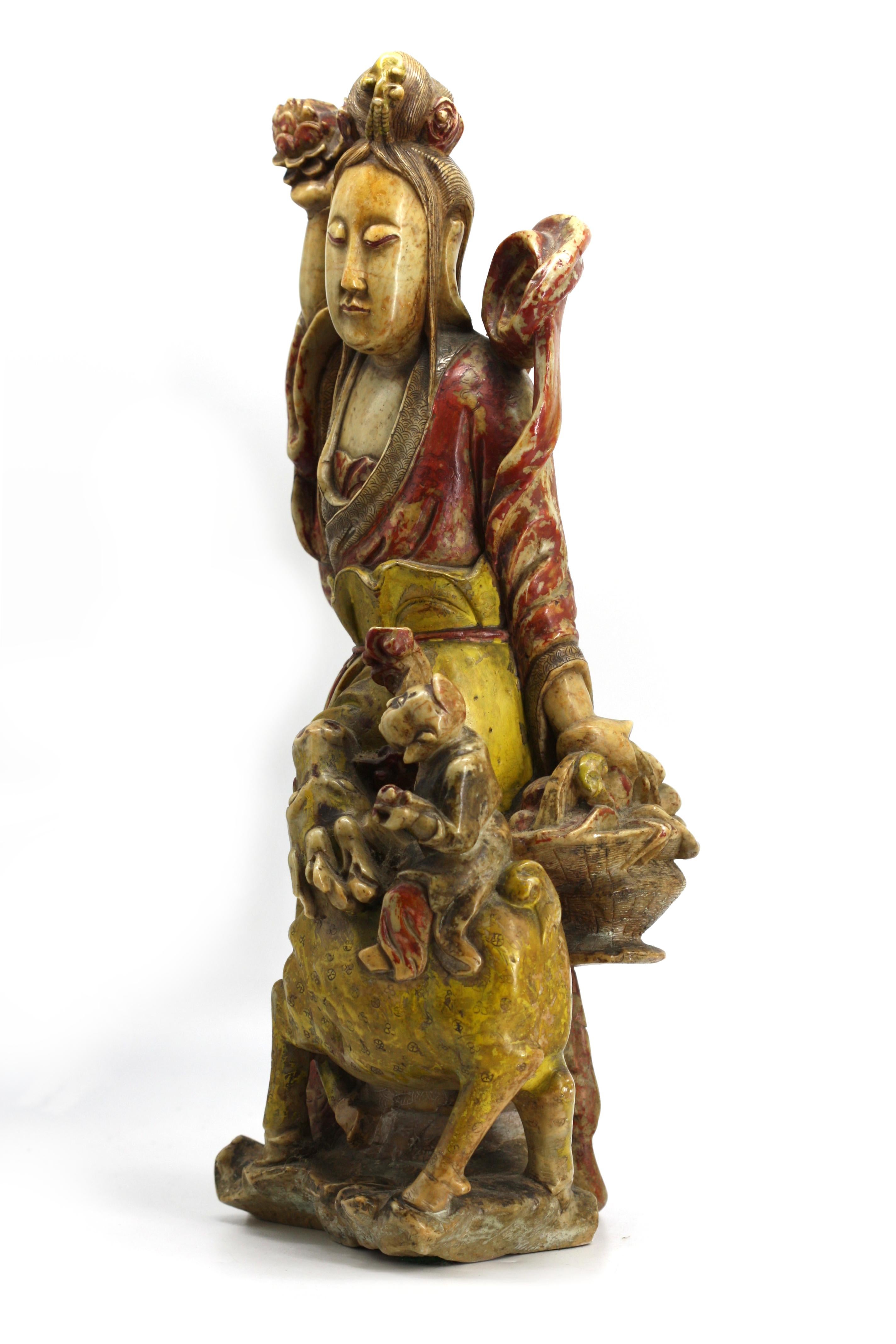 
Chinese Painted Marble Figure of Guanyin
Early 20th Century. The lady draped in elegant robes, a child atop a deer at her side, painted red and yellow. (repair to one arm, old crack to body, not through)
Height 18.5 in., Width 8 in., Depth 6.5