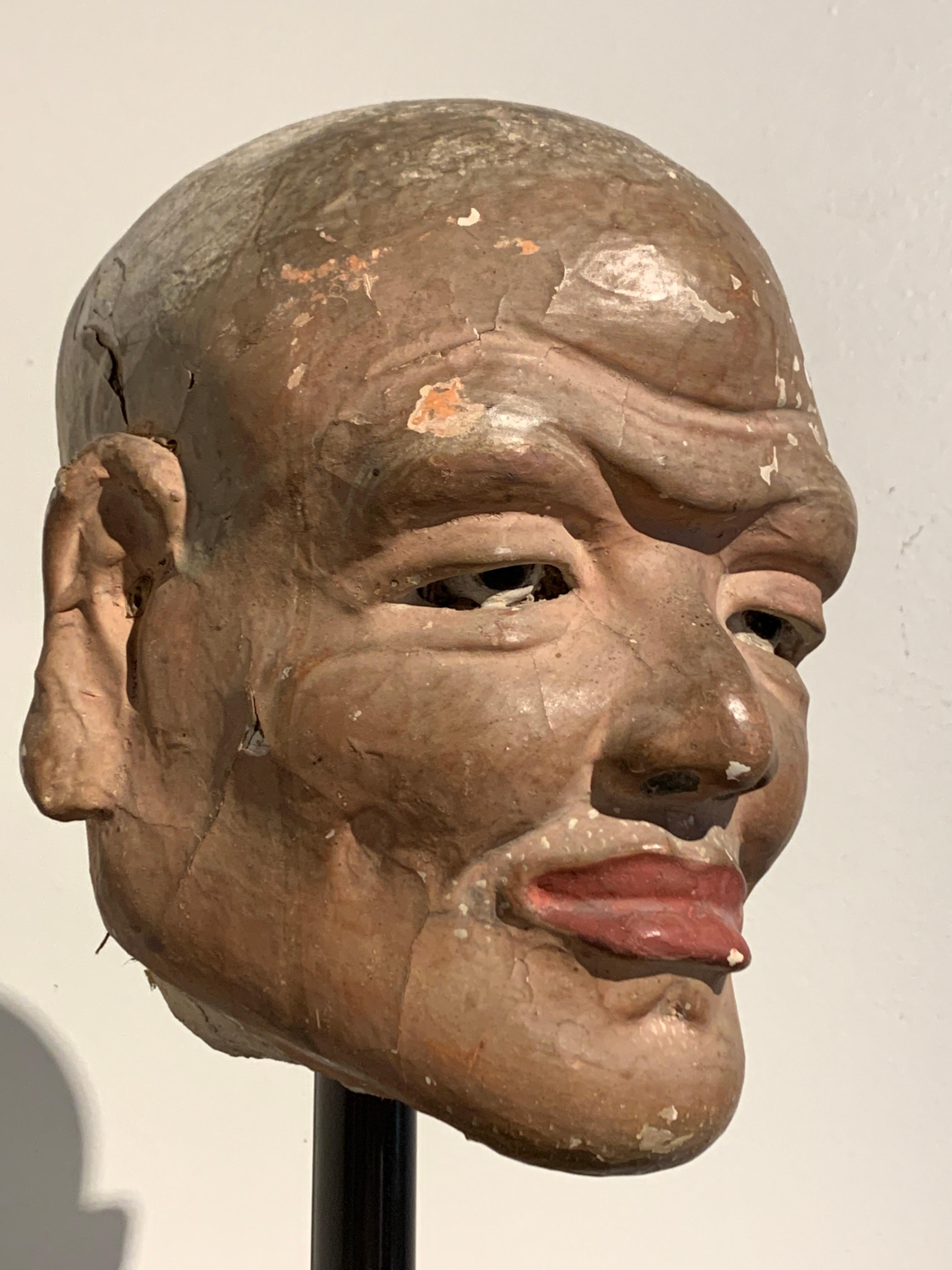 18th Century and Earlier Chinese Painted Stucco Head of a Luohan, Song Dynasty, 11th Century, China For Sale