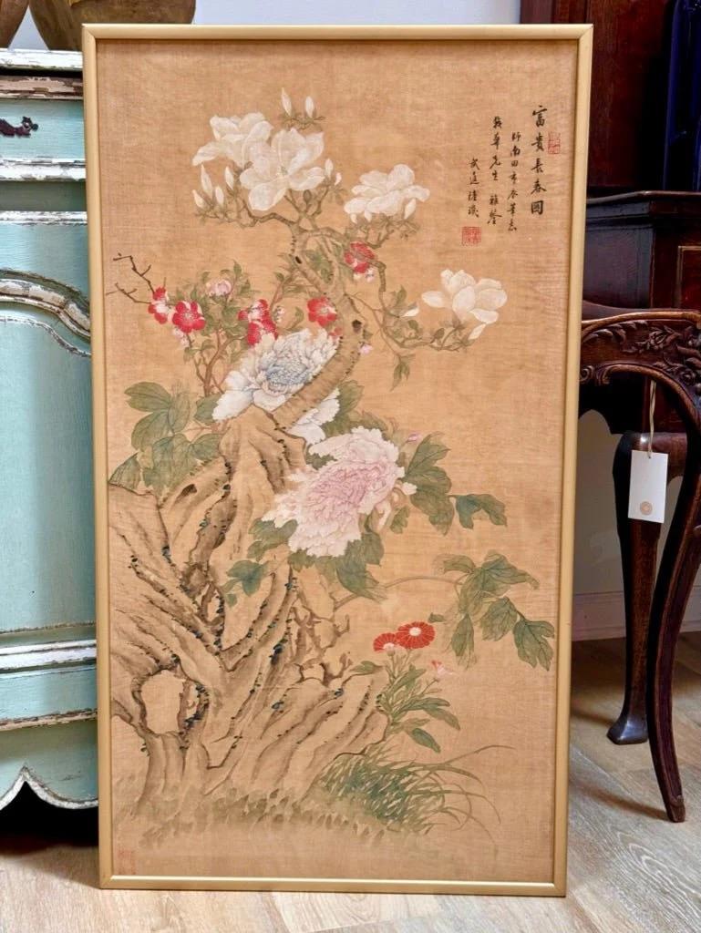 Chinese Painting of Flowers on Silk, 17th Century, mounted and framed.  Attributed to Lu Ji, Laid Down on Board, stamped and inscribed upper right, stamped lower left, depicting a flowering branch.  Framed: 38.75” h. x 21.50 w.

