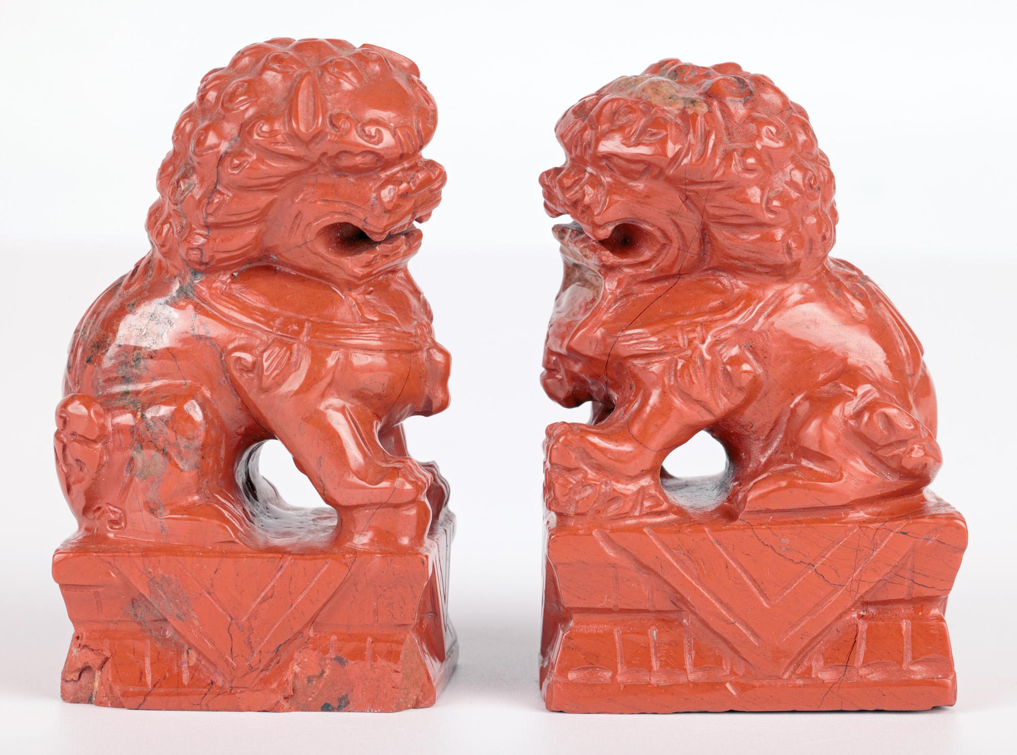 Chinese Pair Hand Carved Red Hardstone Mounted Foo Dogs  For Sale 1