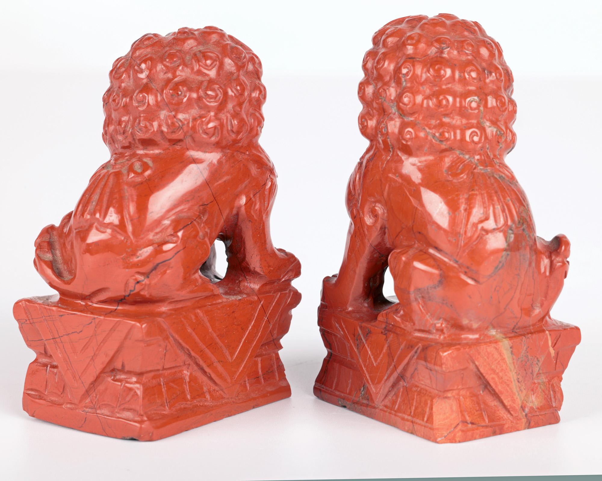 Chinese Pair Hand Carved Red Hardstone Mounted Foo Dogs  For Sale 3