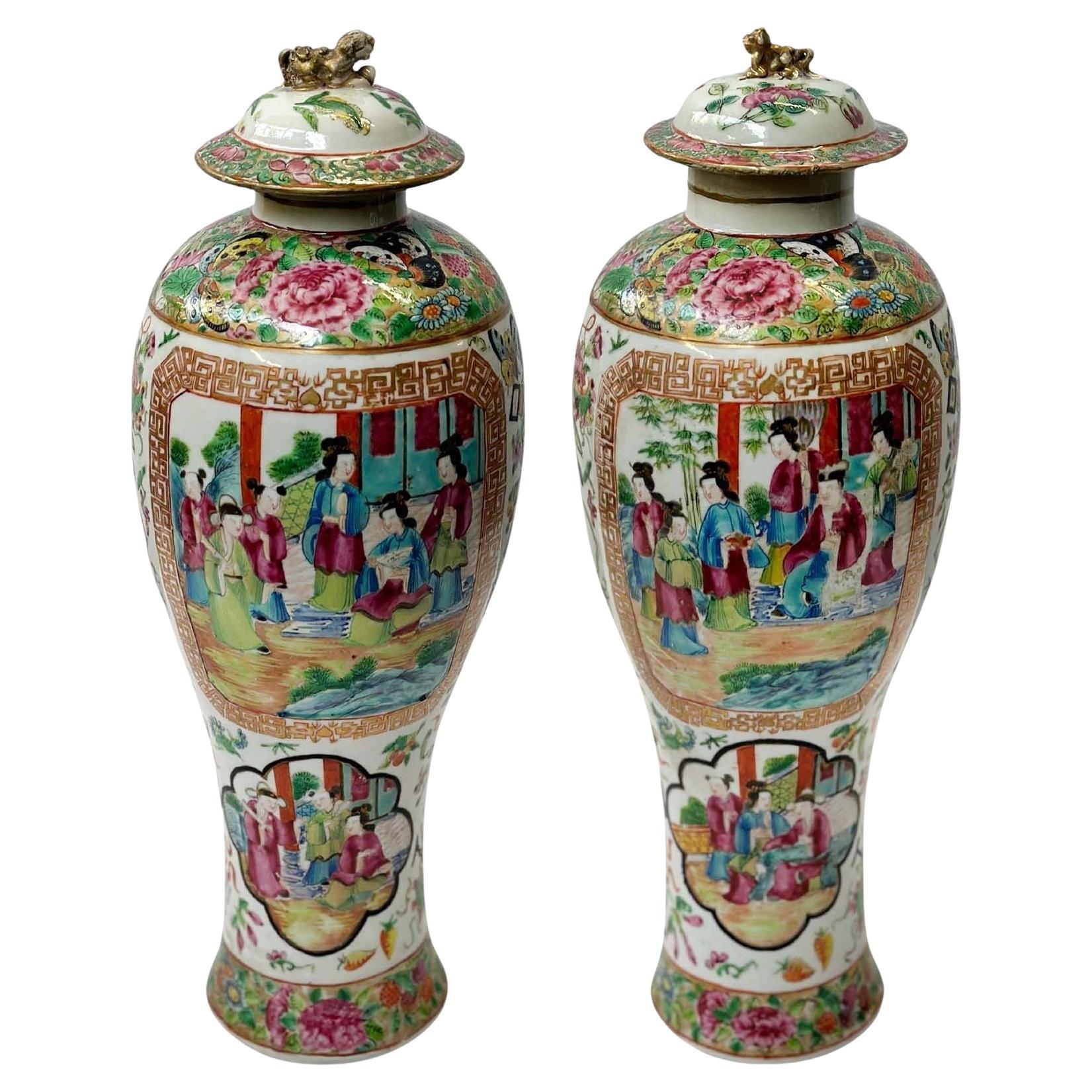 Chinese Pair of Early 19th Century Famille Rose Canton Lidded Vases For Sale