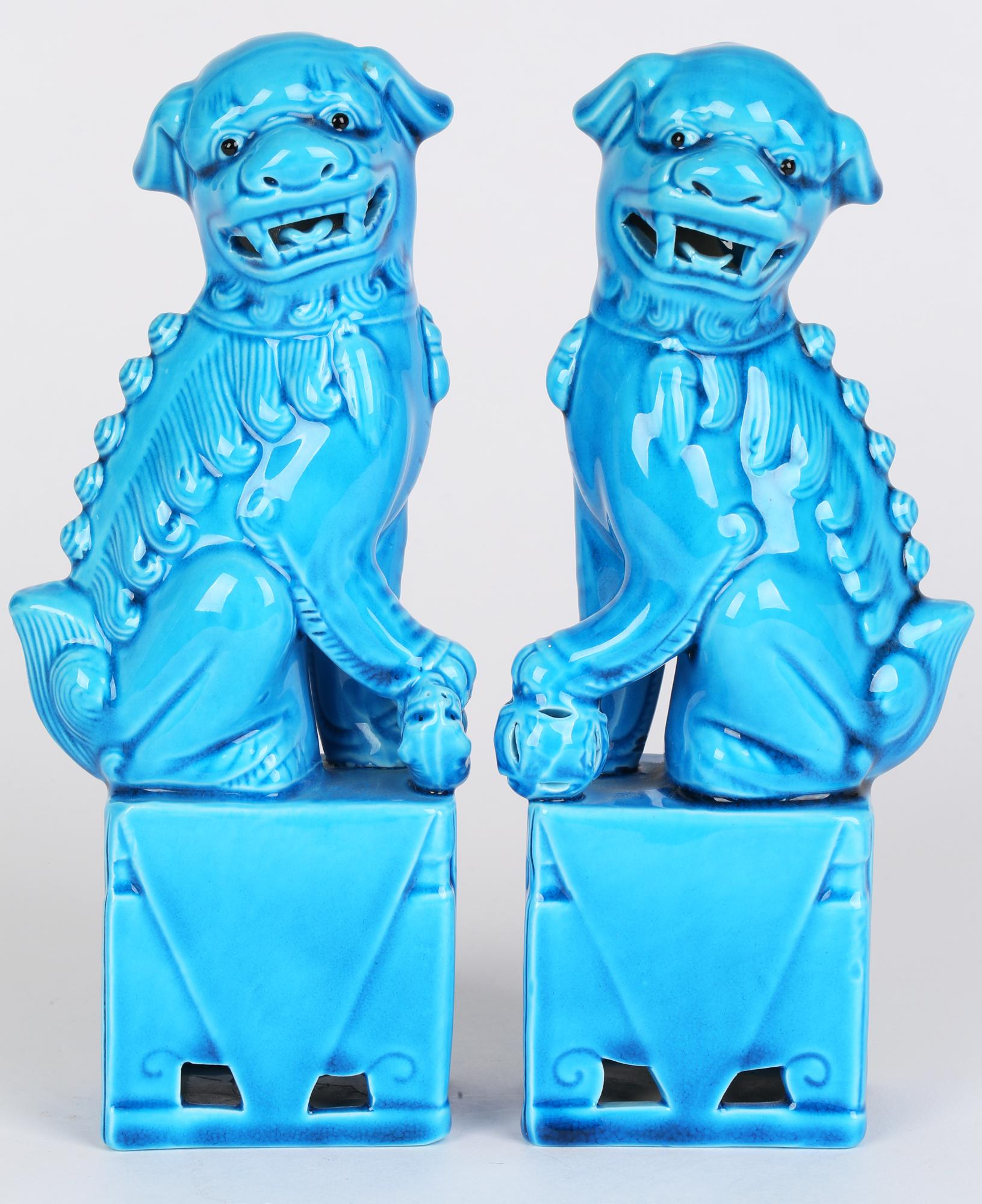 Ceramic Chinese Pair of Turquoise Glazed Porcelain Mounted Food Dogs