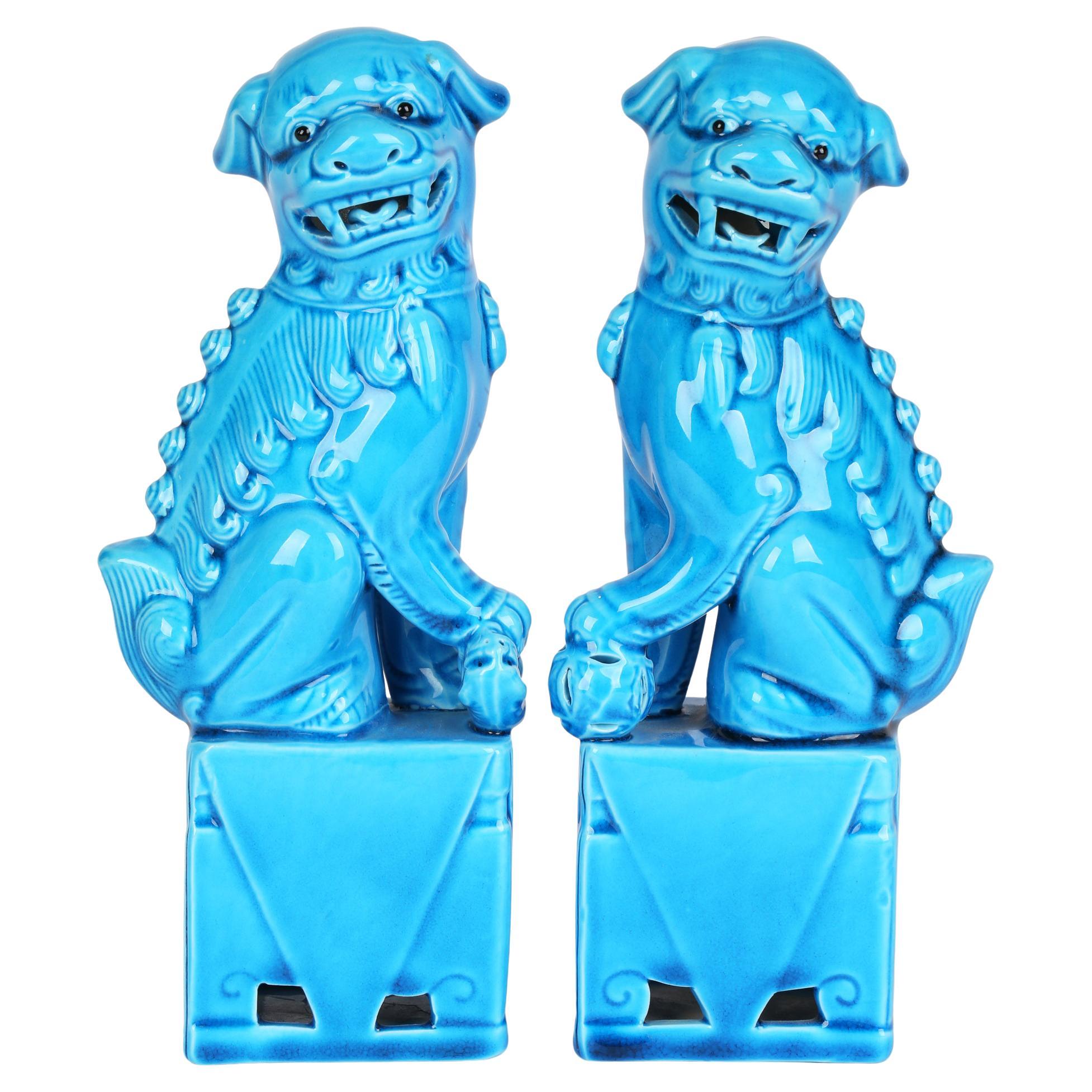 Chinese Pair of Turquoise Glazed Porcelain Mounted Food Dogs