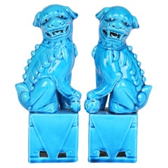 Chinese Pair of Turquoise Glazed Porcelain Mounted Food Dogs