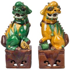 Chinese Pair of Yellow and Green Foo Dogs