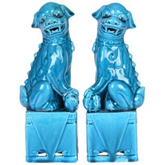 Chinese Pair of Turquoise Glazed Porcelain Mounted Food Dogs