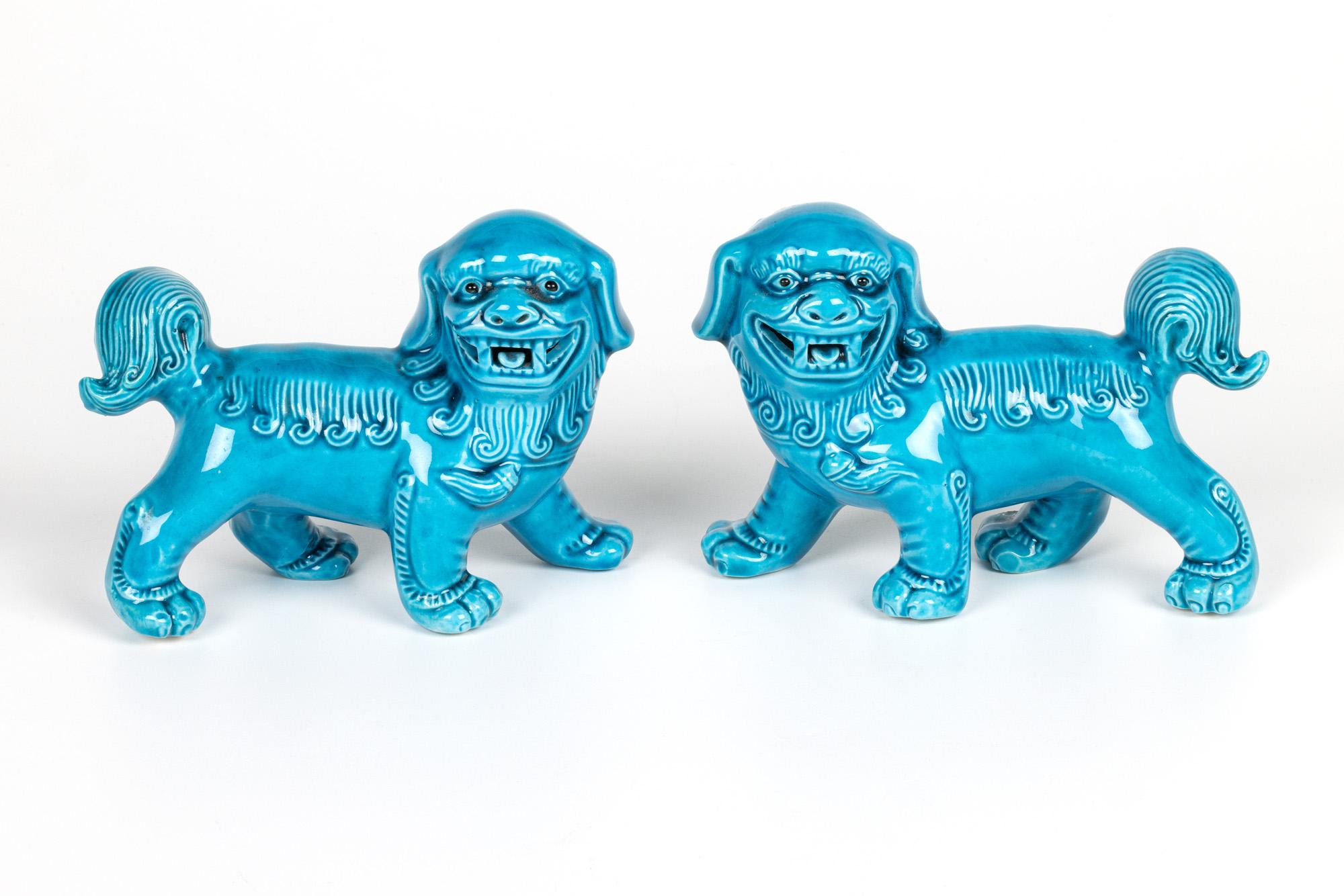 20th Century Chinese Pair Turquoise Glazed Porcelain Standing Foo Dogs For Sale