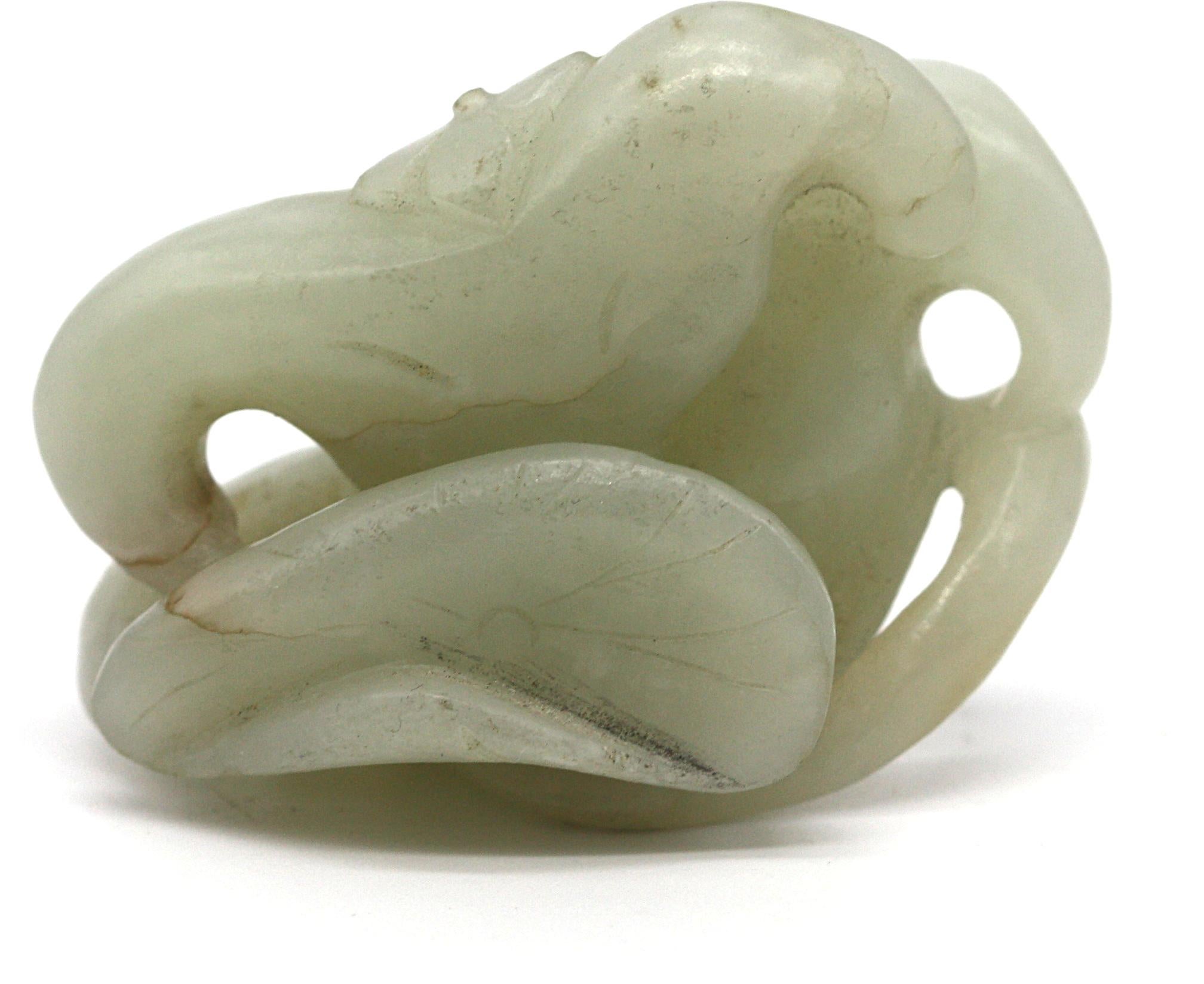
Chinese Pale Celadon Jade Foliate Study.
Qing Dynasty. Asymmetrical and consistent in its color.
Height 1.5 in., Width 2.25 in.
Condition Report
Good condition.