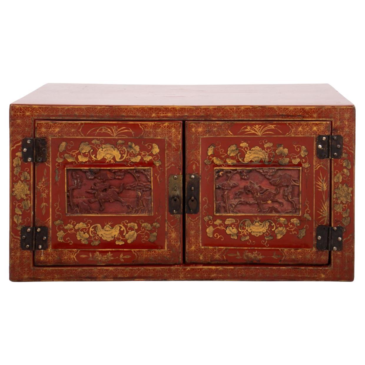 Chinese Parcel Gilt Red Lacquer Cabinet For Sale