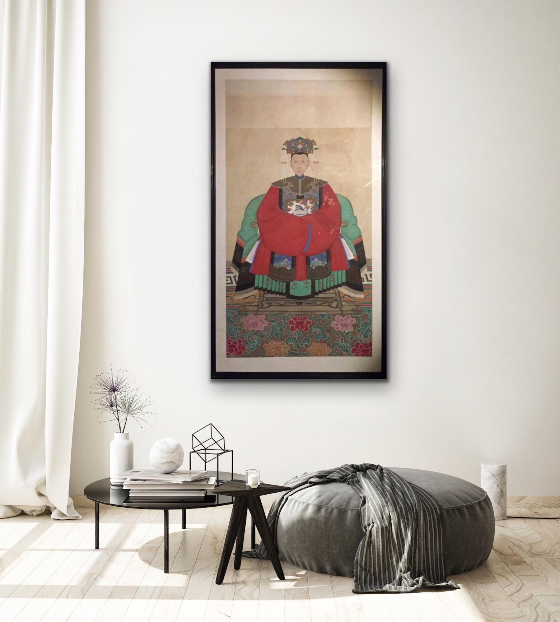 A large 19th century framed Chinese patriarch ancestral painting on fine linen or silk.

The vibrant, bright array of colors of this finely framed piece would make it really pop against a modern, fresh scheme. 

These are proving increasingly