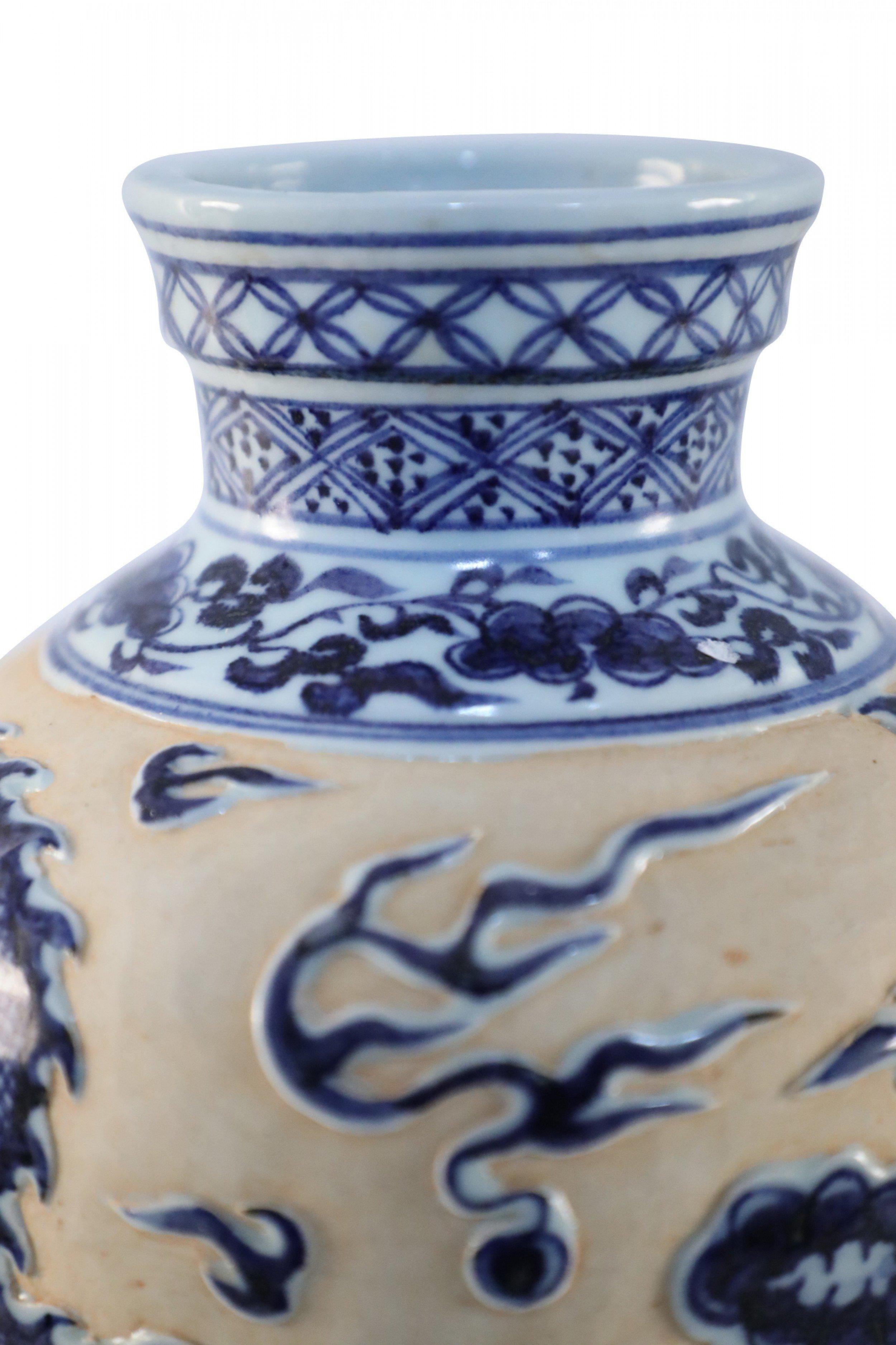 Chinese Peach, White and Blue Dragon Motif Porcelain Vase In Good Condition In New York, NY