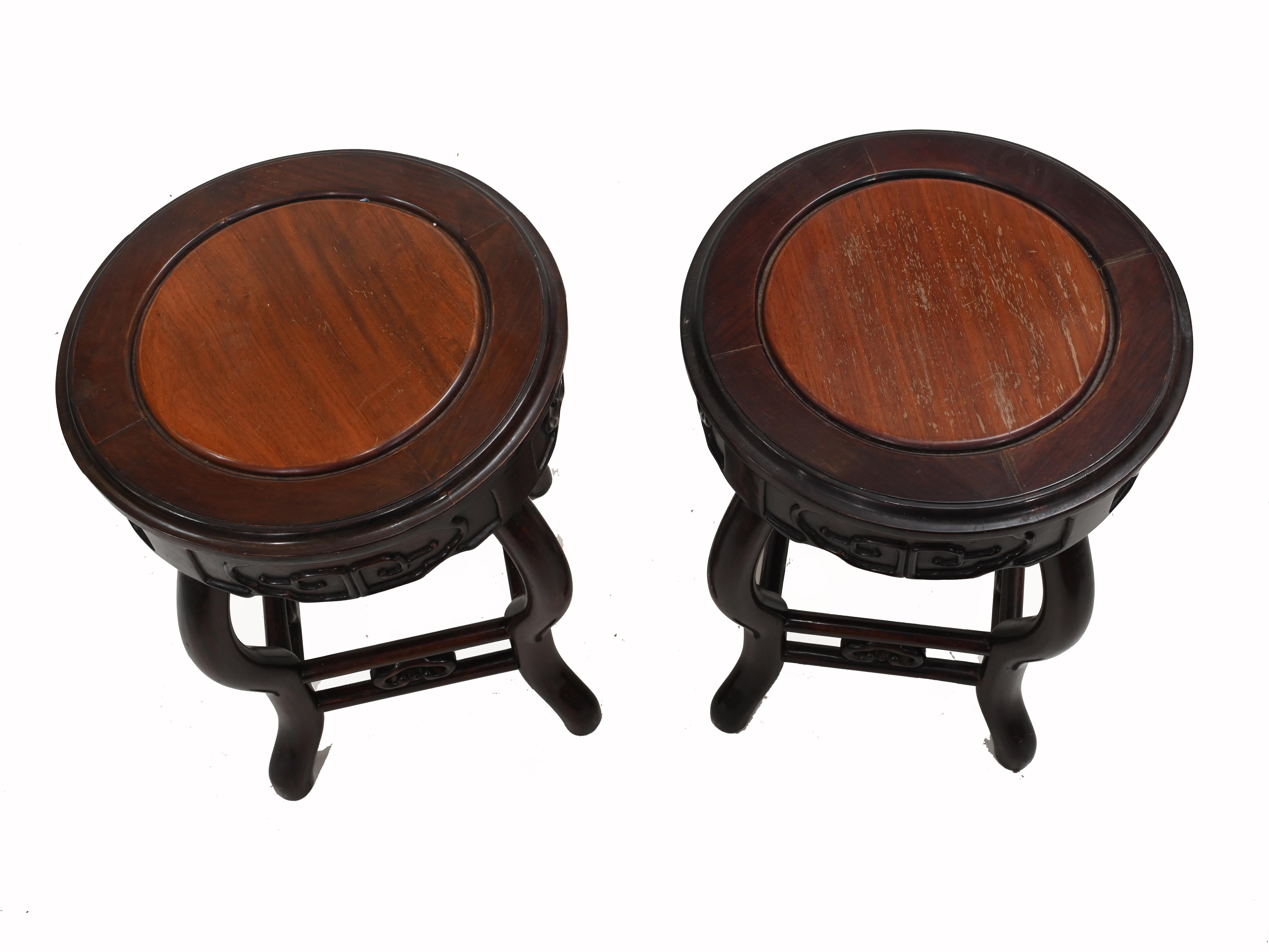 Elegant pair of Chinese pedestal stands in hardwood
Great for displaying decorative pieces such as urns or vases
Circa 1930 
Some of our items are in storage so please check ahead of a viewing to see if it is on our shop floor
Offered in great