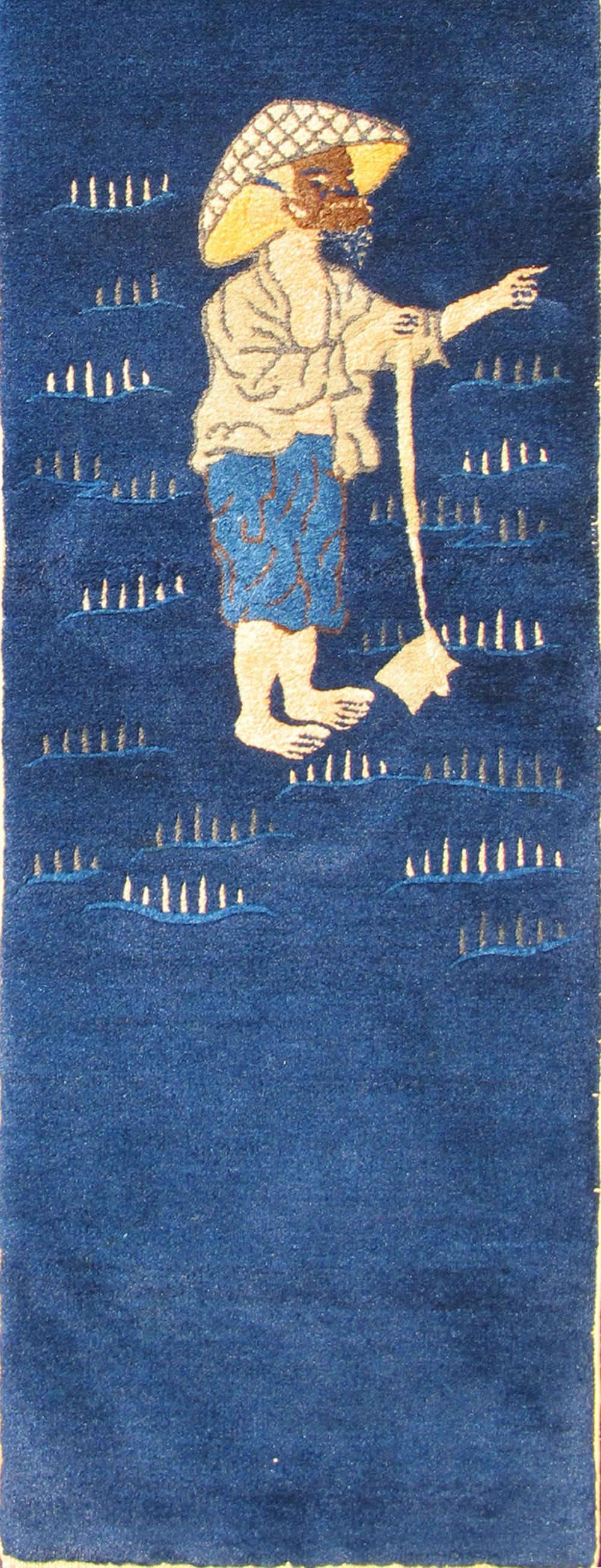 Art Deco Chinese Peking Carpet Featuring Lone Man in Sapphire and Golden Yellow Tones For Sale