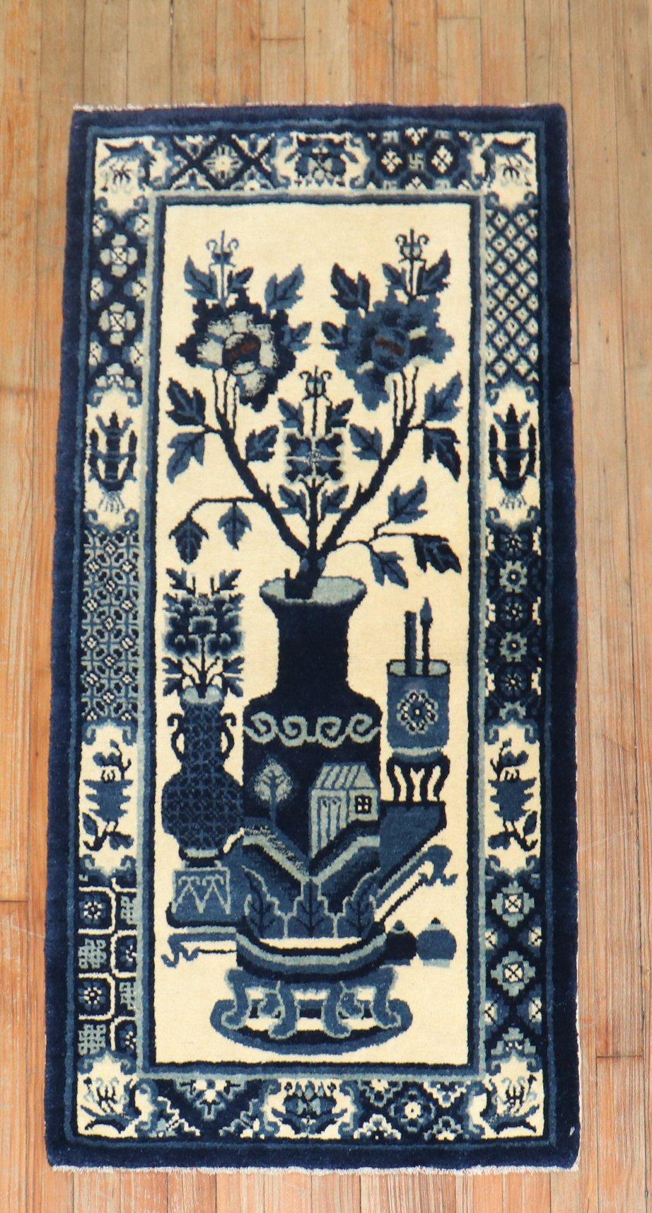 Chinese Peking scatter size Rug from the early 20th Century

2'2'' x 4'3''