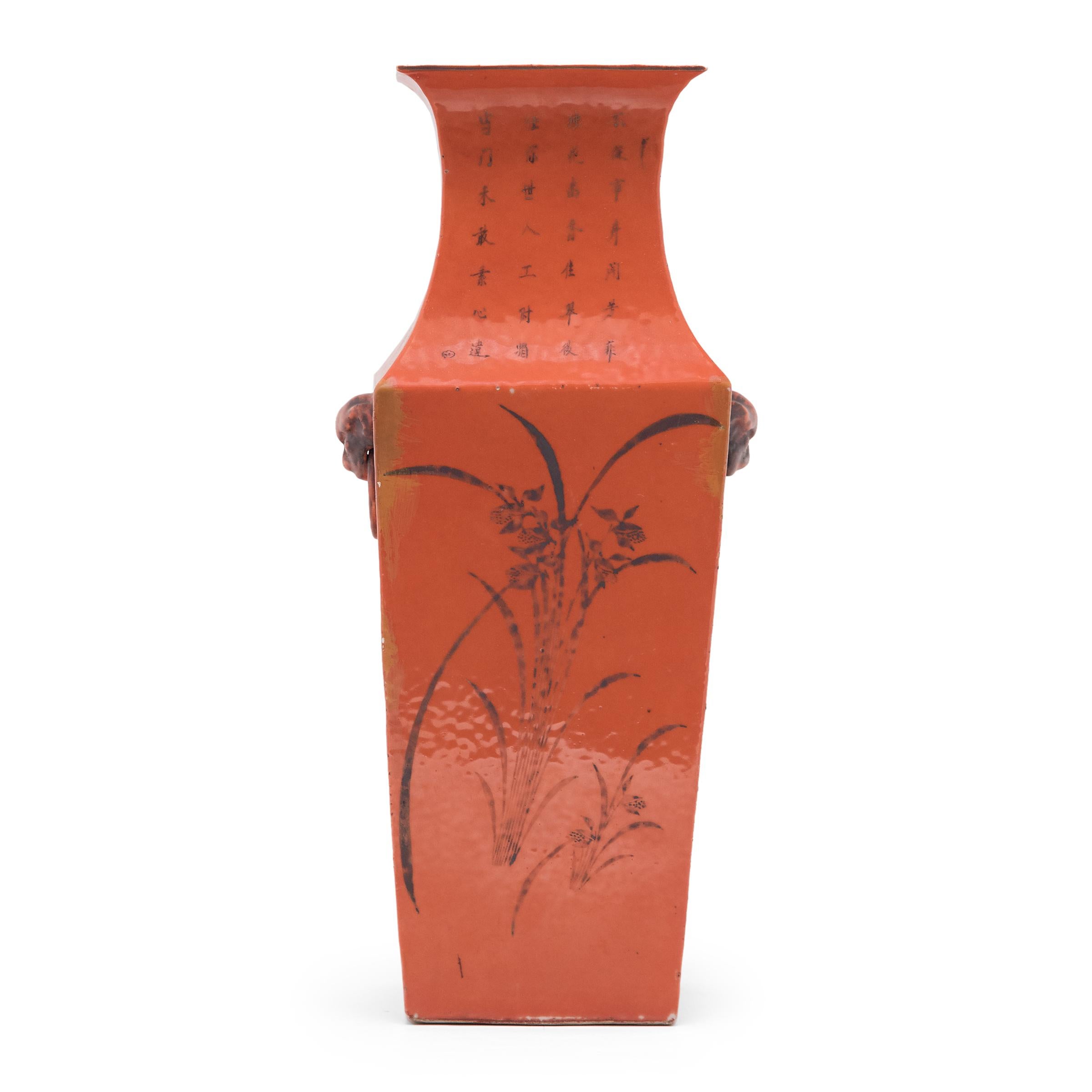 With bright color and sculptural form, this squared vase combines the centuries-old phoenix tail vase form with a rich persimmon-orange glaze, popularized during the Art Deco movement of the early 20th century. The vase is decorated on all sides