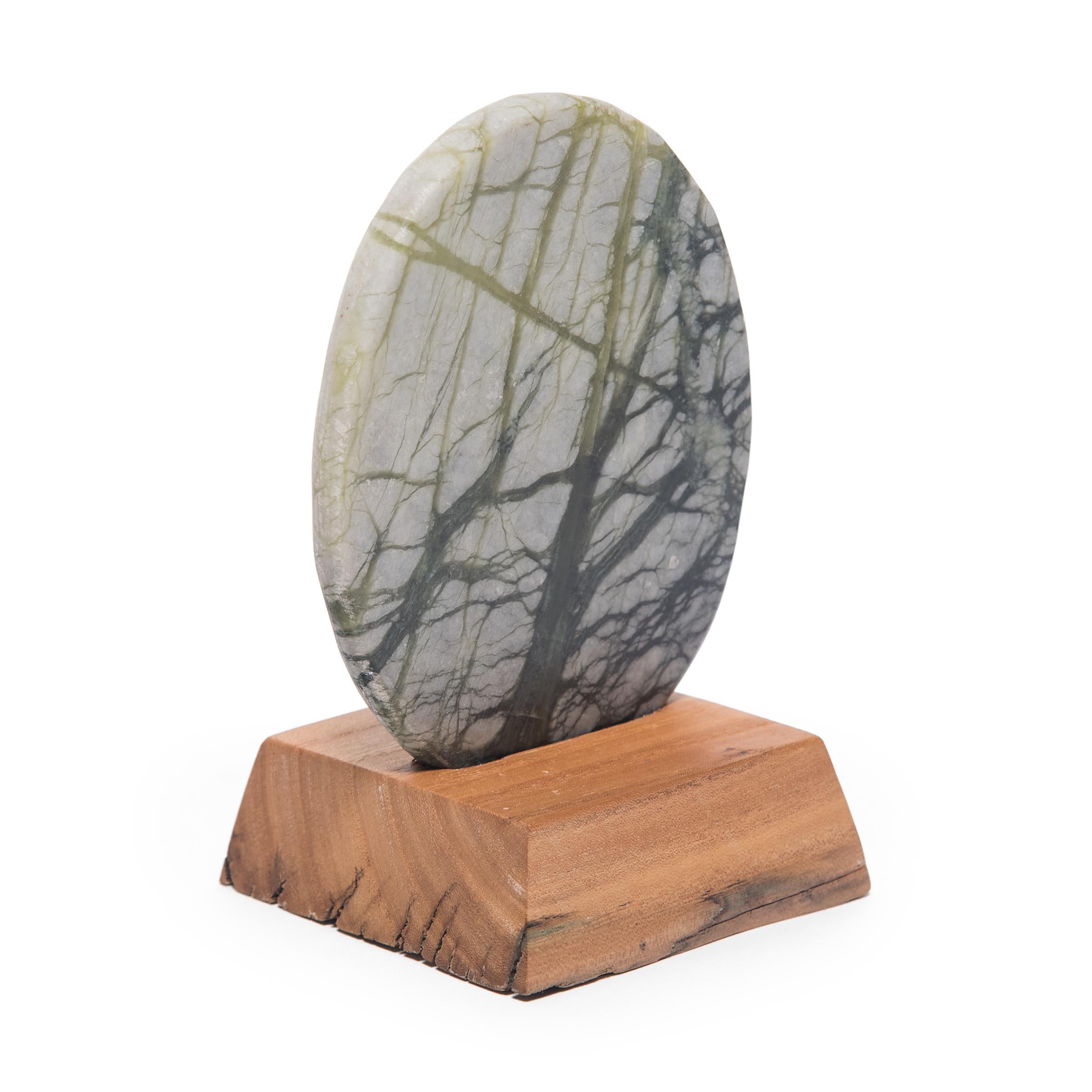 A well-chosen stone is a resting place for the mind, inspiring calm and contemplation. Marked by currents of jadeite, moss agate, and serpentine, our petite greenery stones evoke the grandeur of nature with beautiful patterns that capture the