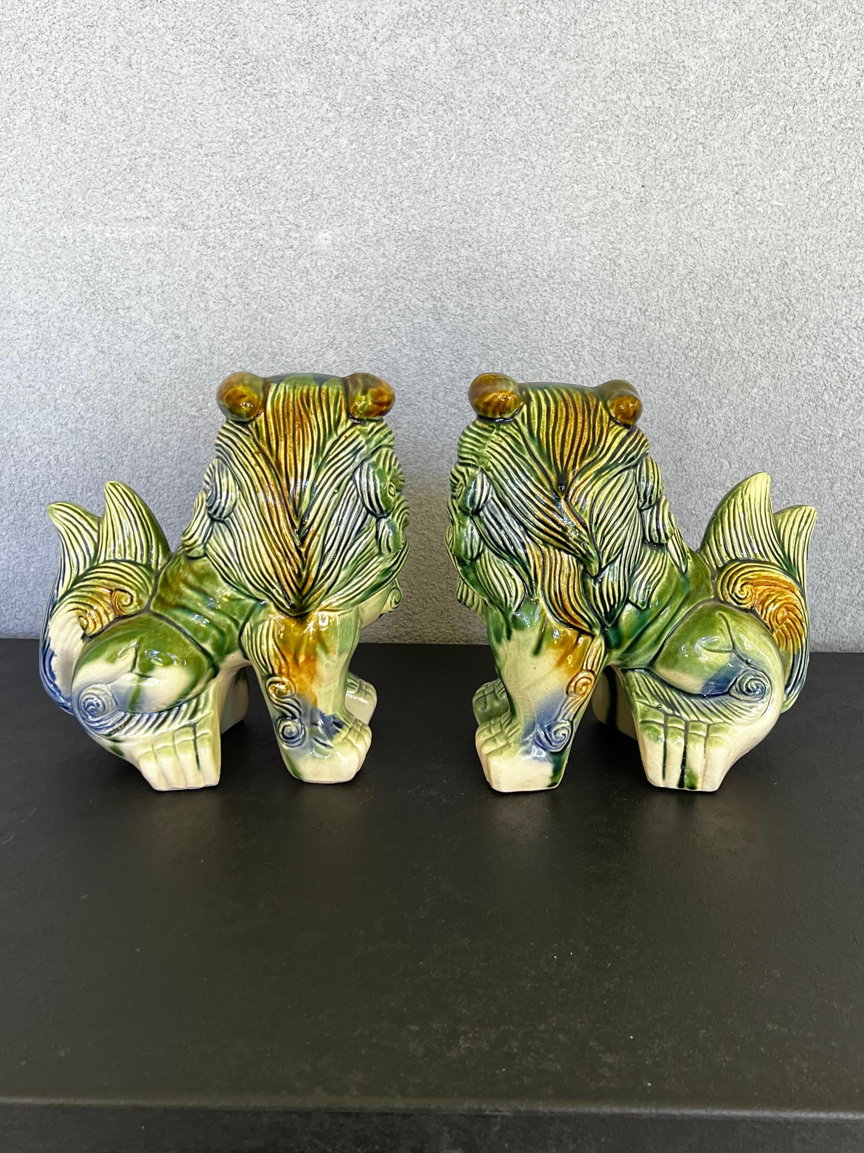 20th Century Chinese Polychrome Ceramic Glaze Foo Dogs - a Pair