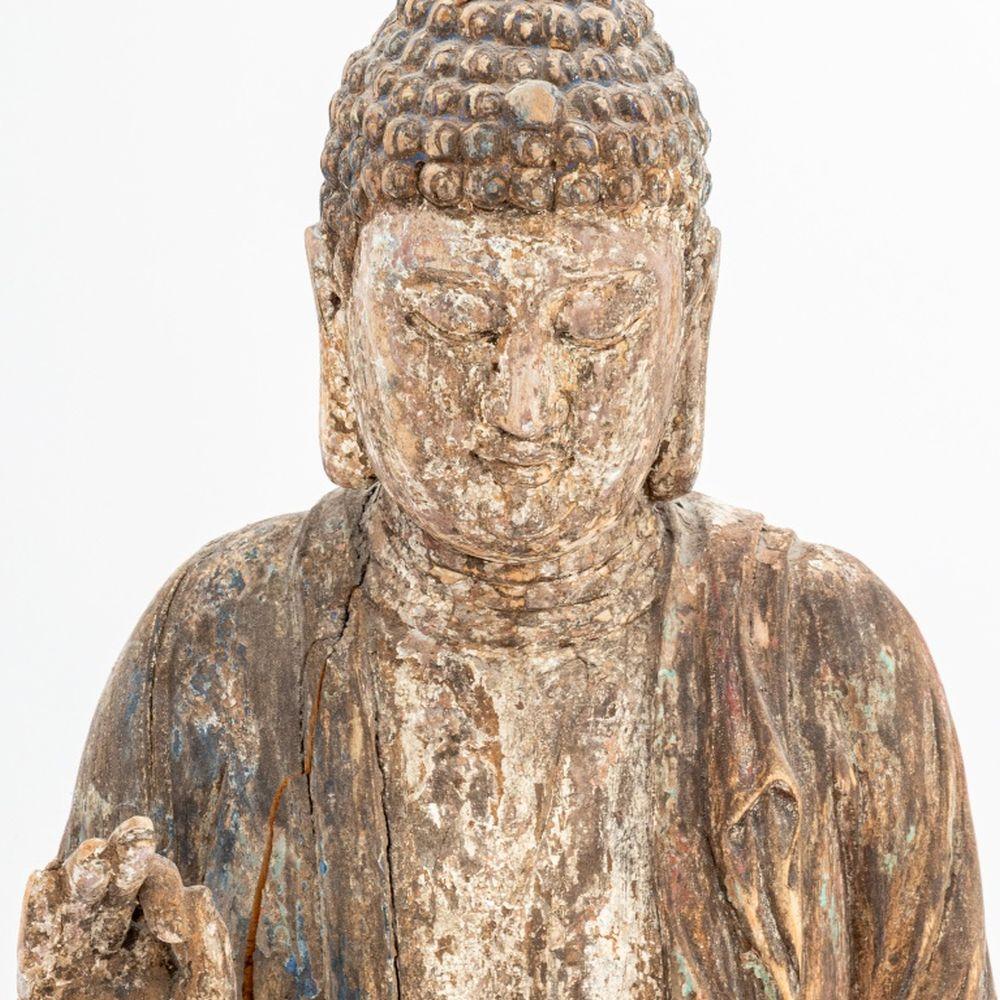 Chinese Polychrome Painted and Carved Wood Standing Buddha Sculpture, possibly Ming Dynasty, remnants of wax seal to crown of head. 26.5