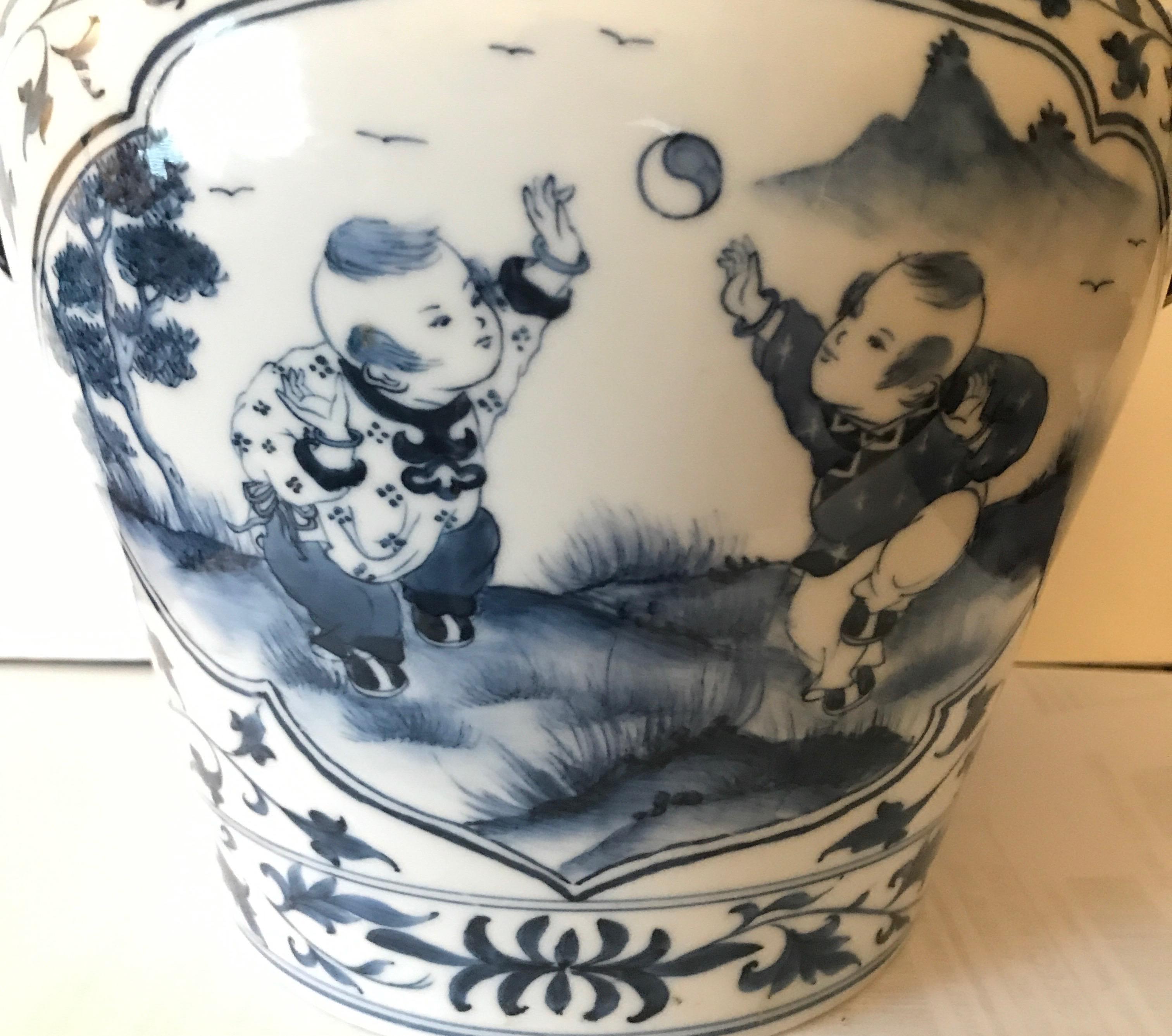 Hand painted blue and white chines porcelain covered jar, Republic Period. Blue under-glaze mark on bottom.
