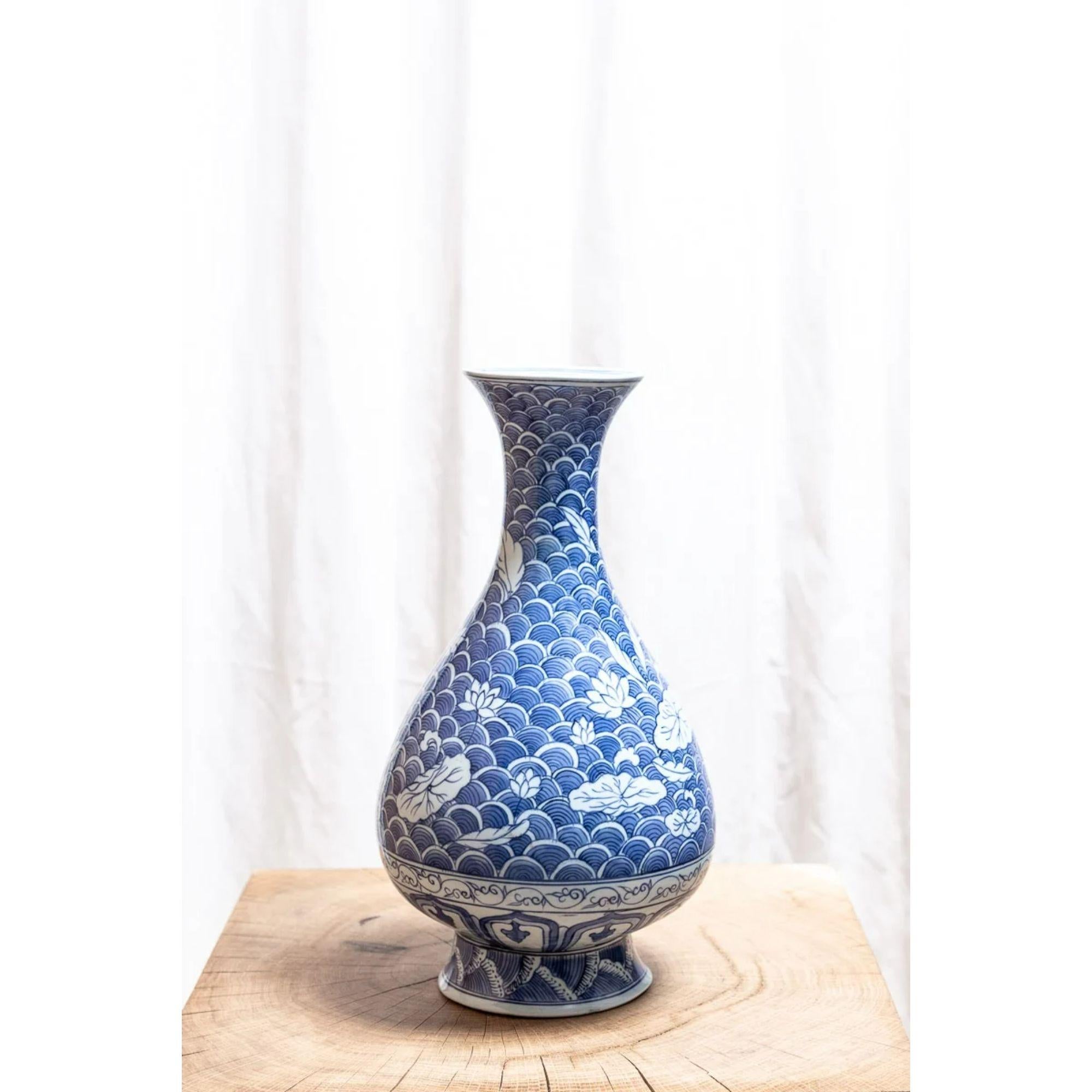 19th Century Chinese porcelain blue and white vase lamp.

A Chinese porcelain blue white baluster vase with flared neck.

Decorated with water lilies and lotus flowers.

Price includes wiring to specification as a lamp. Shade images are shown