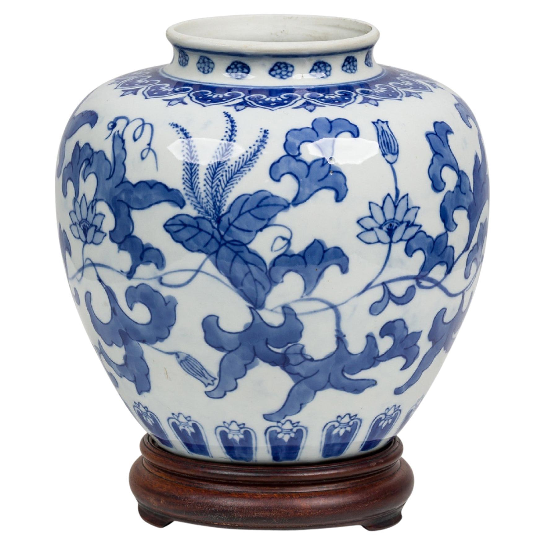 Chinese Porcelain Blue & White Floral Ginger Jar on Carved Wood Stand For Sale