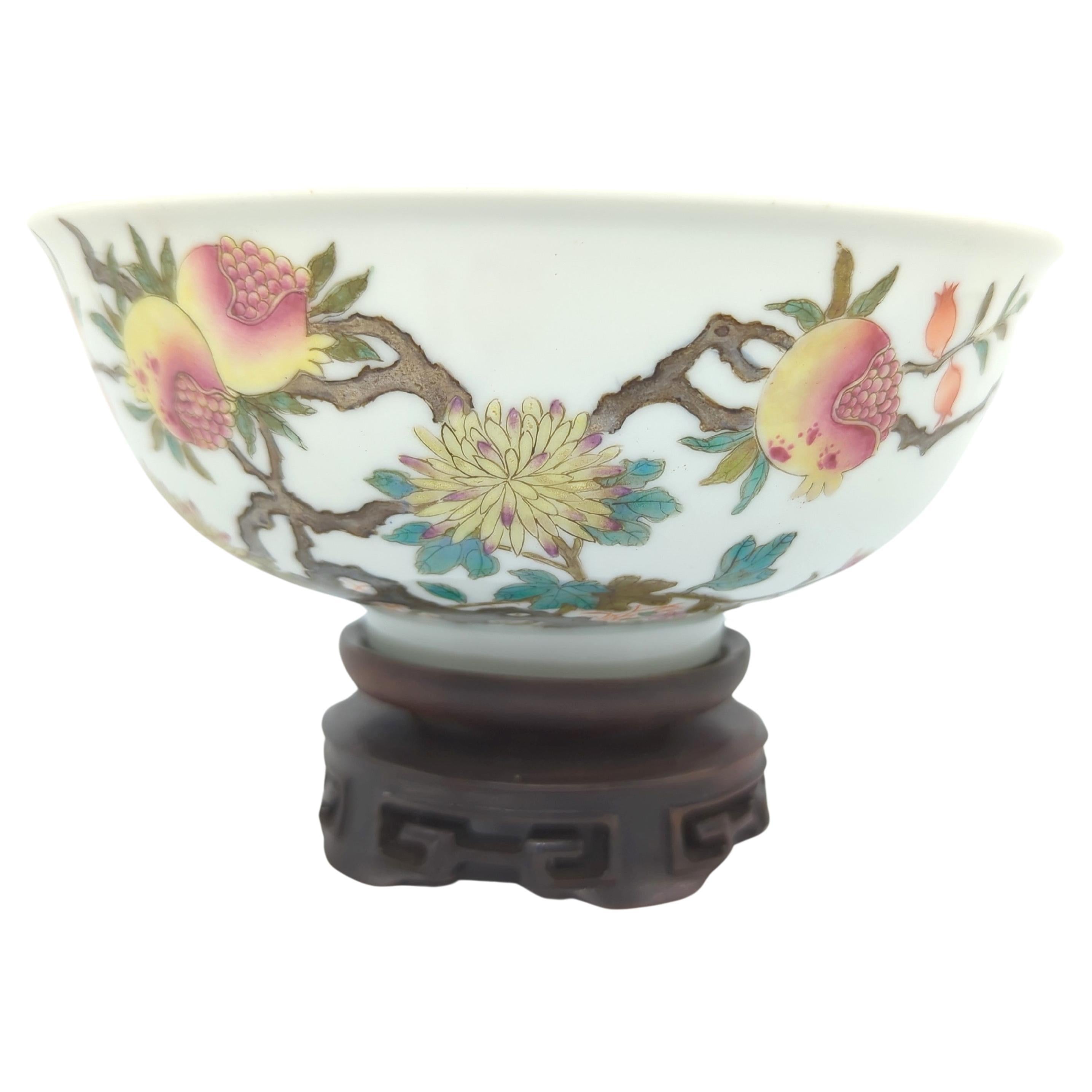 This Qing Dynasty Daoguang period famille rose porcelain bowl is a masterful example of Chinese ceramic artistry, reflecting the aesthetic sensibilities and technical prowess of its time. The exterior of the bowl is finely painted in the famille