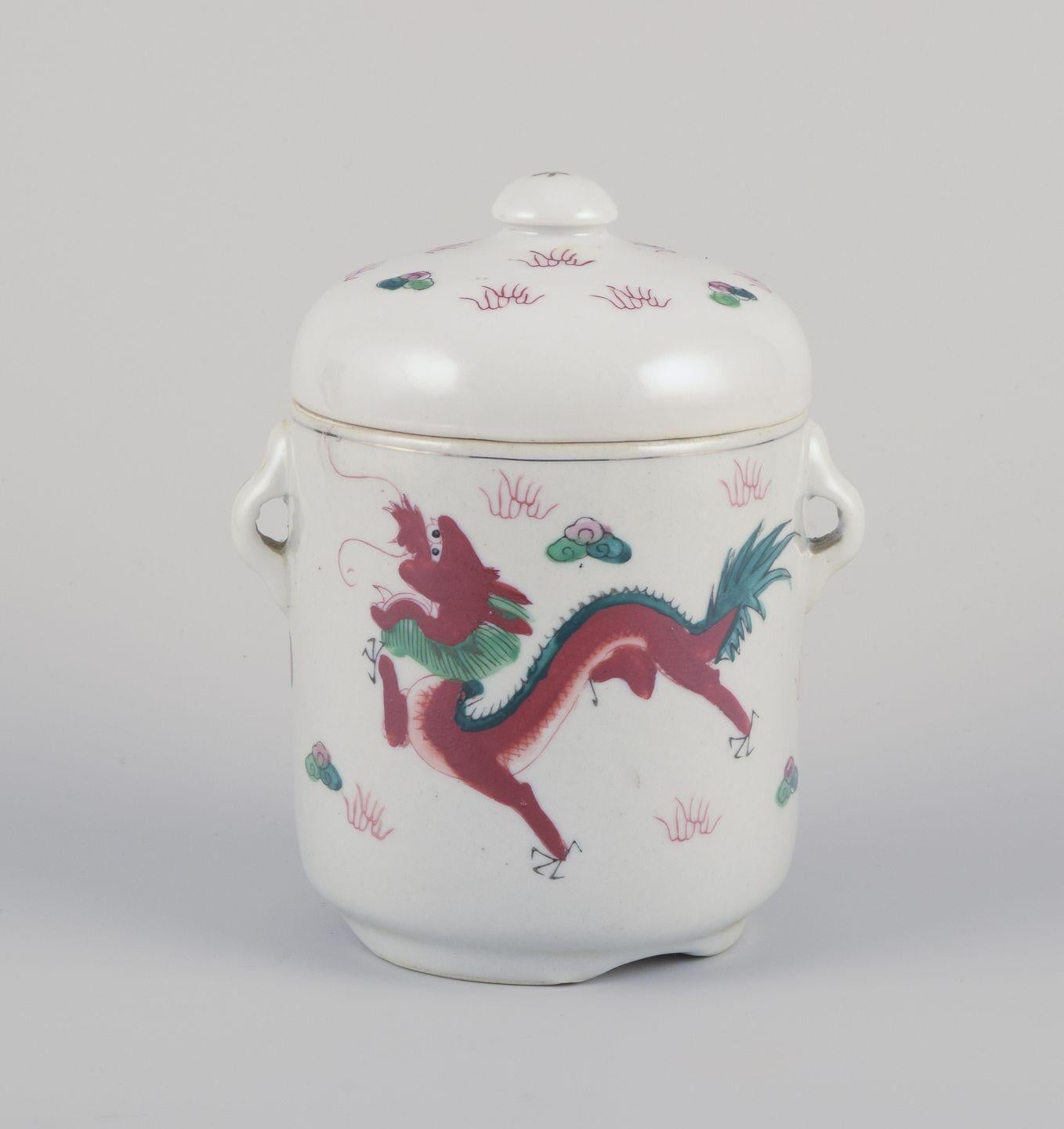 Pre-owned goods are exempt from import duties for U.S. customers. 
Therefore, no import tariffs will be applicable to your purchase.

Chinese porcelain container with two lids.
Hand-painted motif of dragons.
20th century.
Marked.
Condition: Perfect