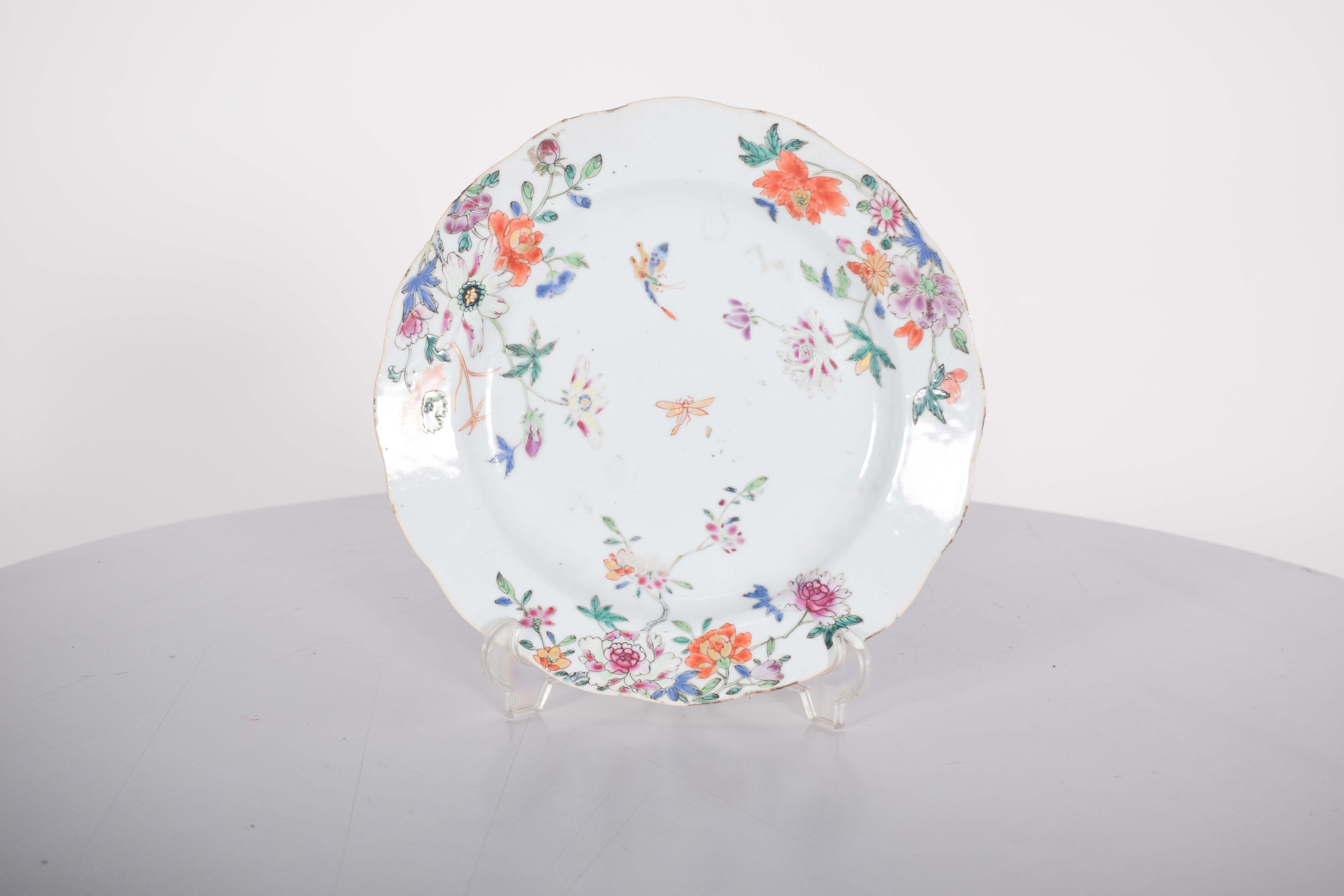 Chinese deep plate porcelain for export. Qing Dynasty, Jiaqing period (1736-1795).
 Polychrome decoration with flowers, leaves and dragonflies This plate exemplifies the tradition of export porcelain, widely produced to meet European demand in the