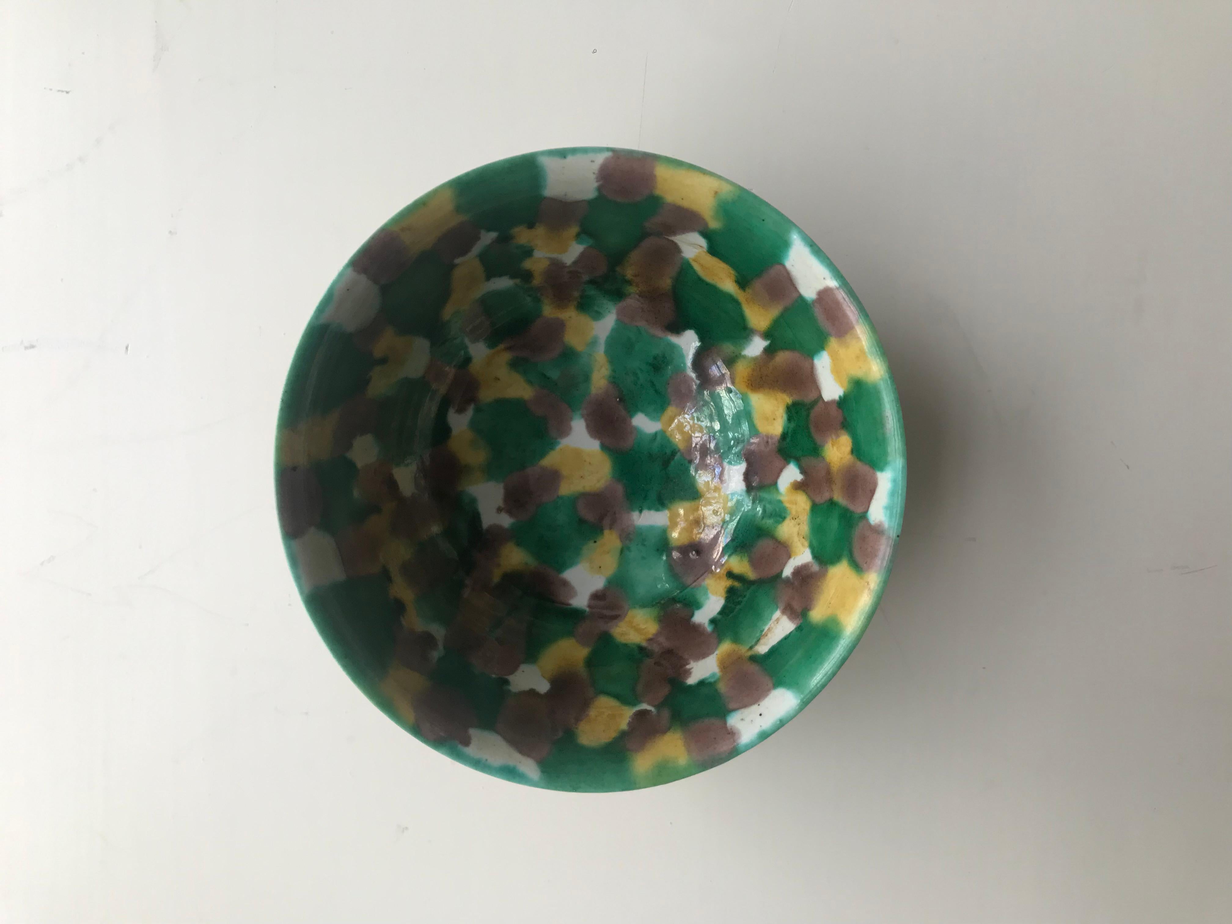 Fine Chinese Porcelain Egg and Spinach Bowl
w. blue Kangxi  mark (1662-1722) on base 

decorated with irregular overlapping yellow, green, brown and cream splashes.
The egg and spinach, or 'susancai' glaze (literally ‘soft three colours’) is made
